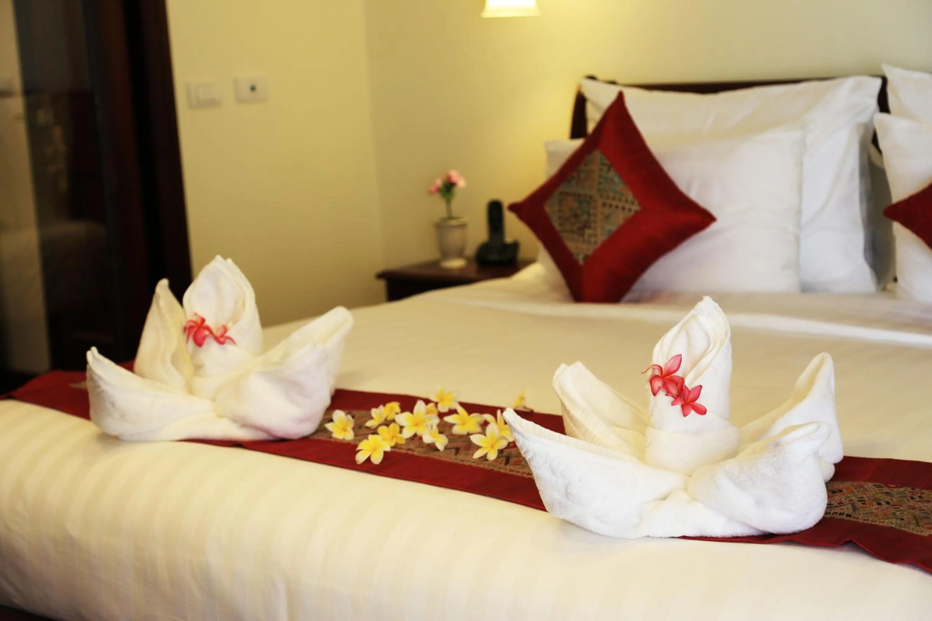 Bed in Phasouk Vien Chantra Hotel