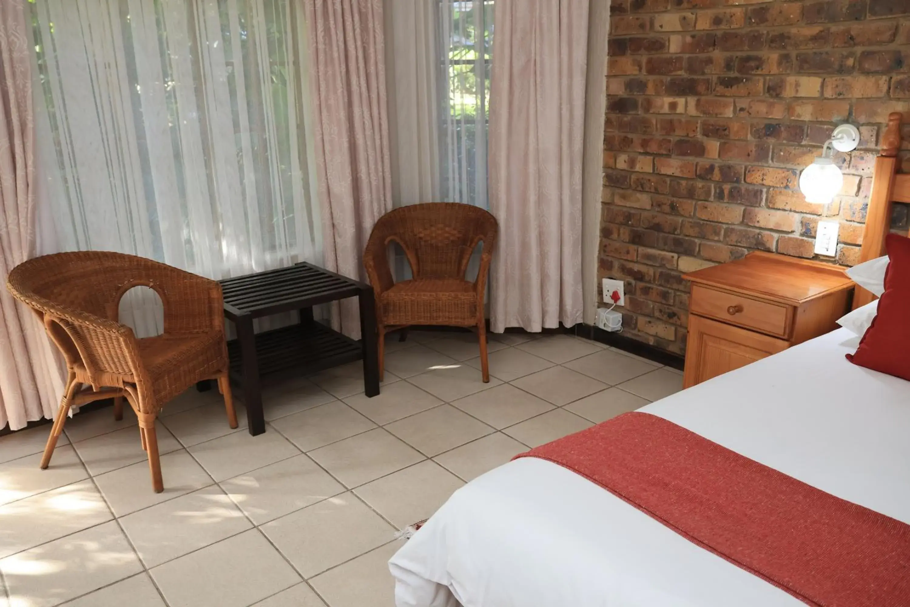 Seating area, Bed in Shingalana Guest Lodge Seating area, Bed in Shingalana Guest Lodge