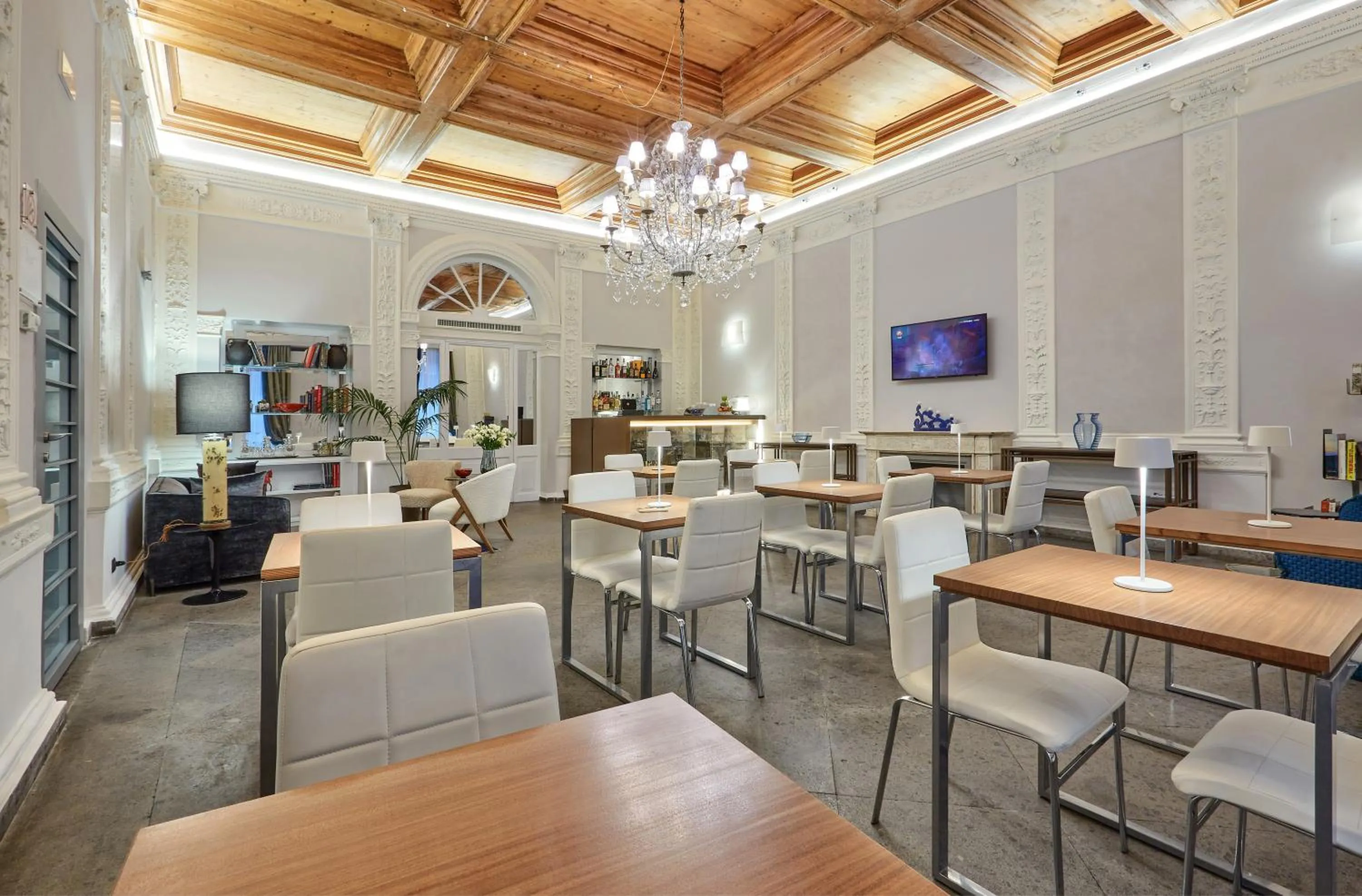 Communal lounge/ TV room in L'obelisque maison de luxe