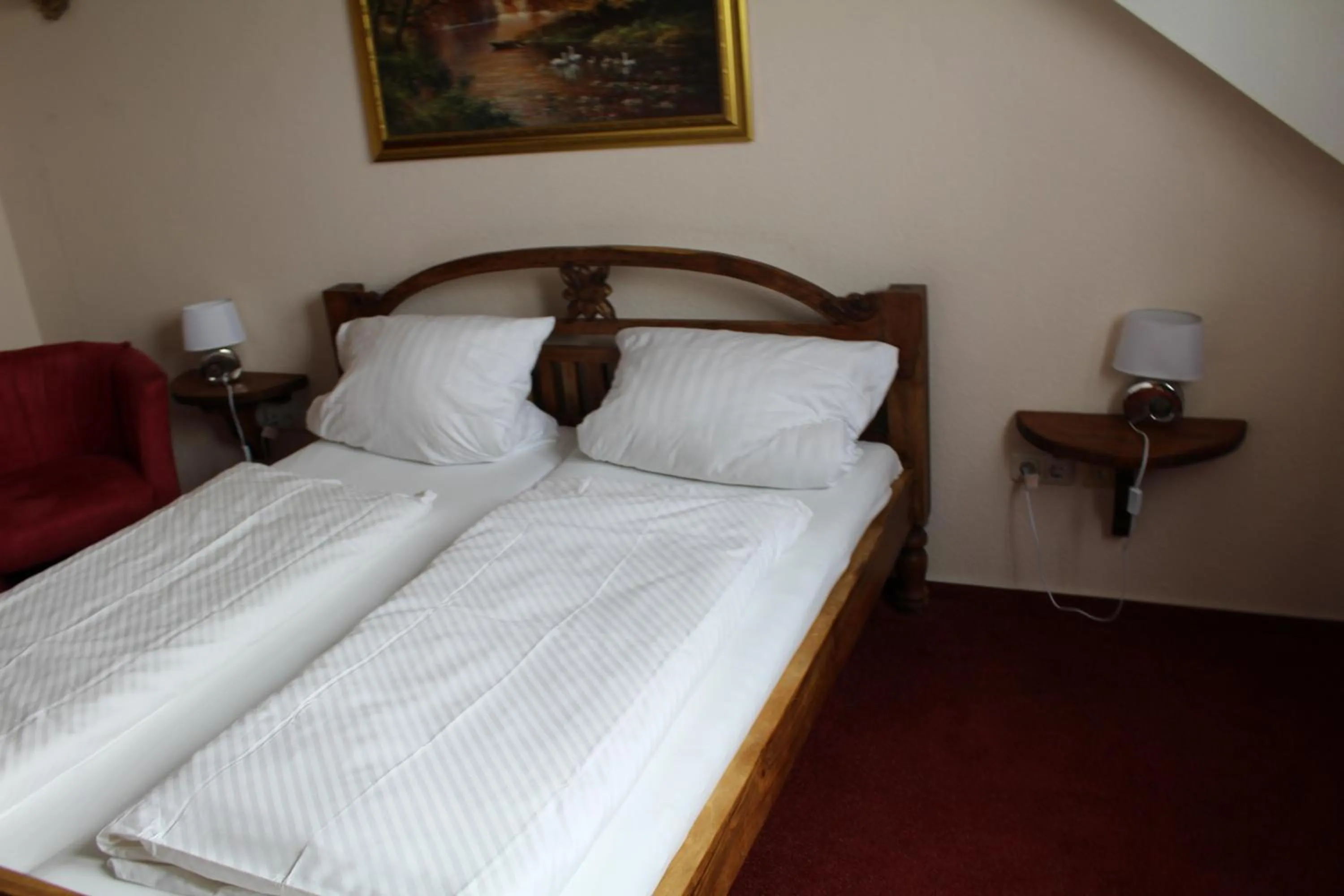 Bed in Hotel Gardenia