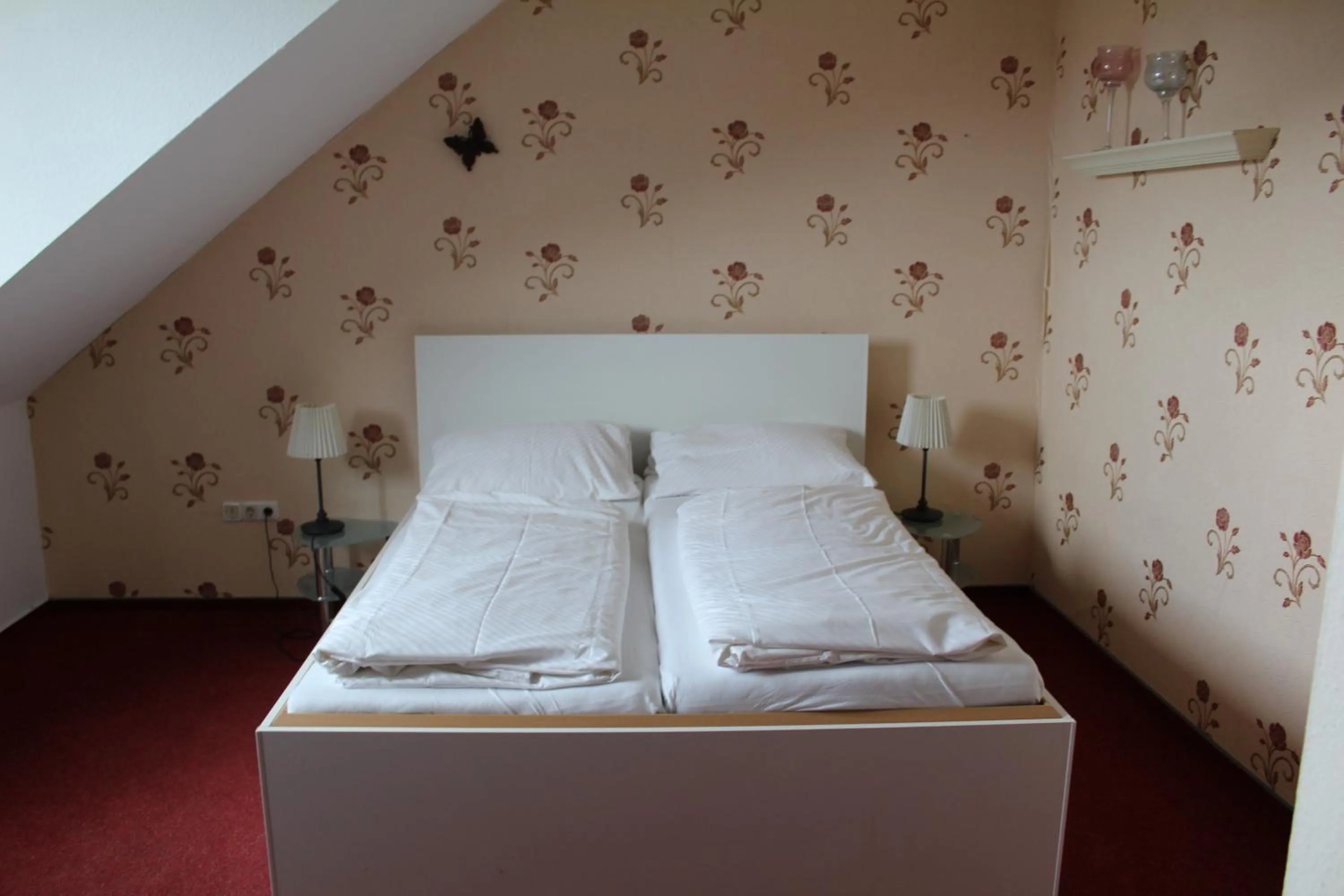 Bed in Hotel Gardenia