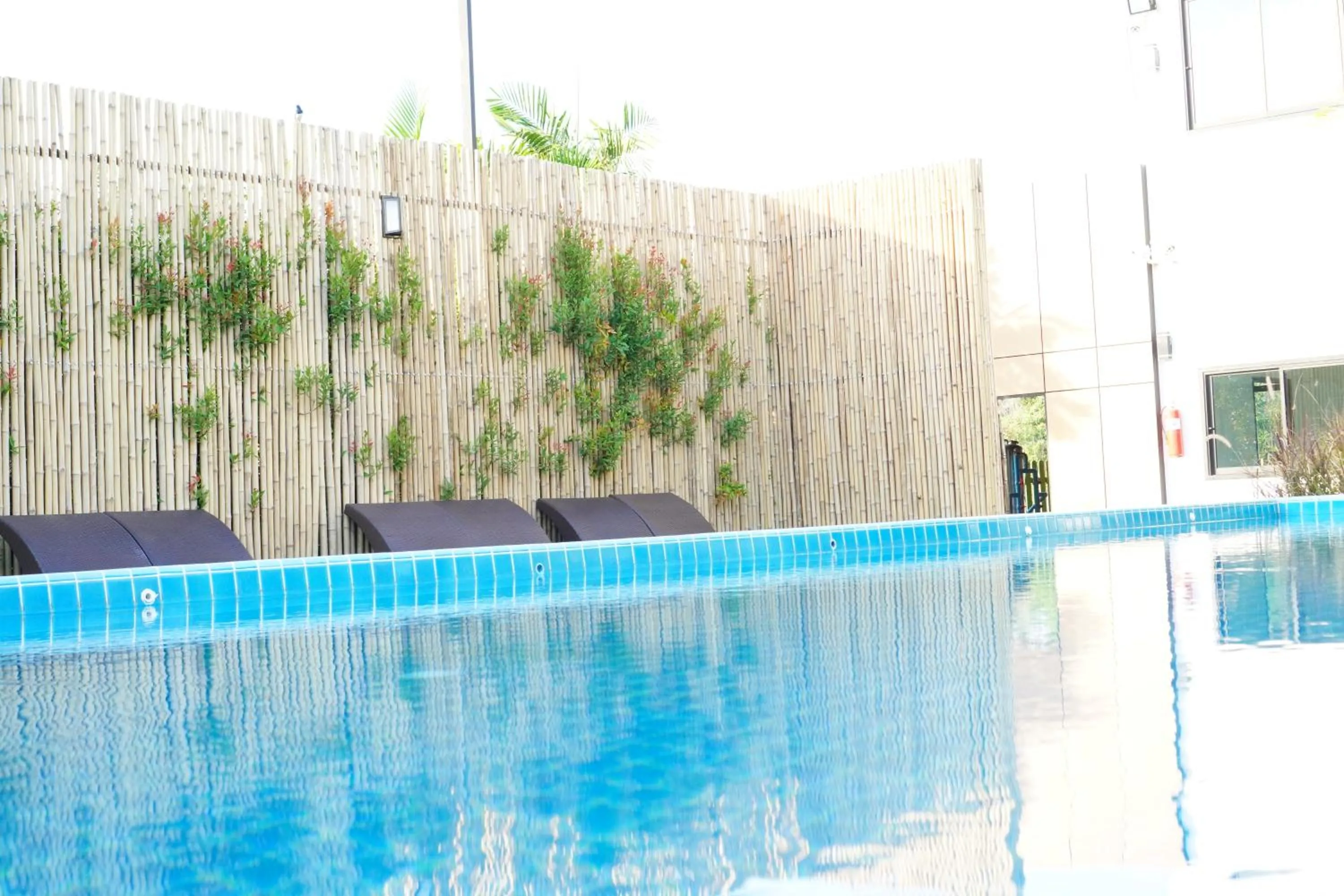 Pool view in IP Plus Resort Chanthaburia - Halal Hotel