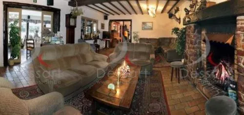 Living room in Hotel Aux Massotais
