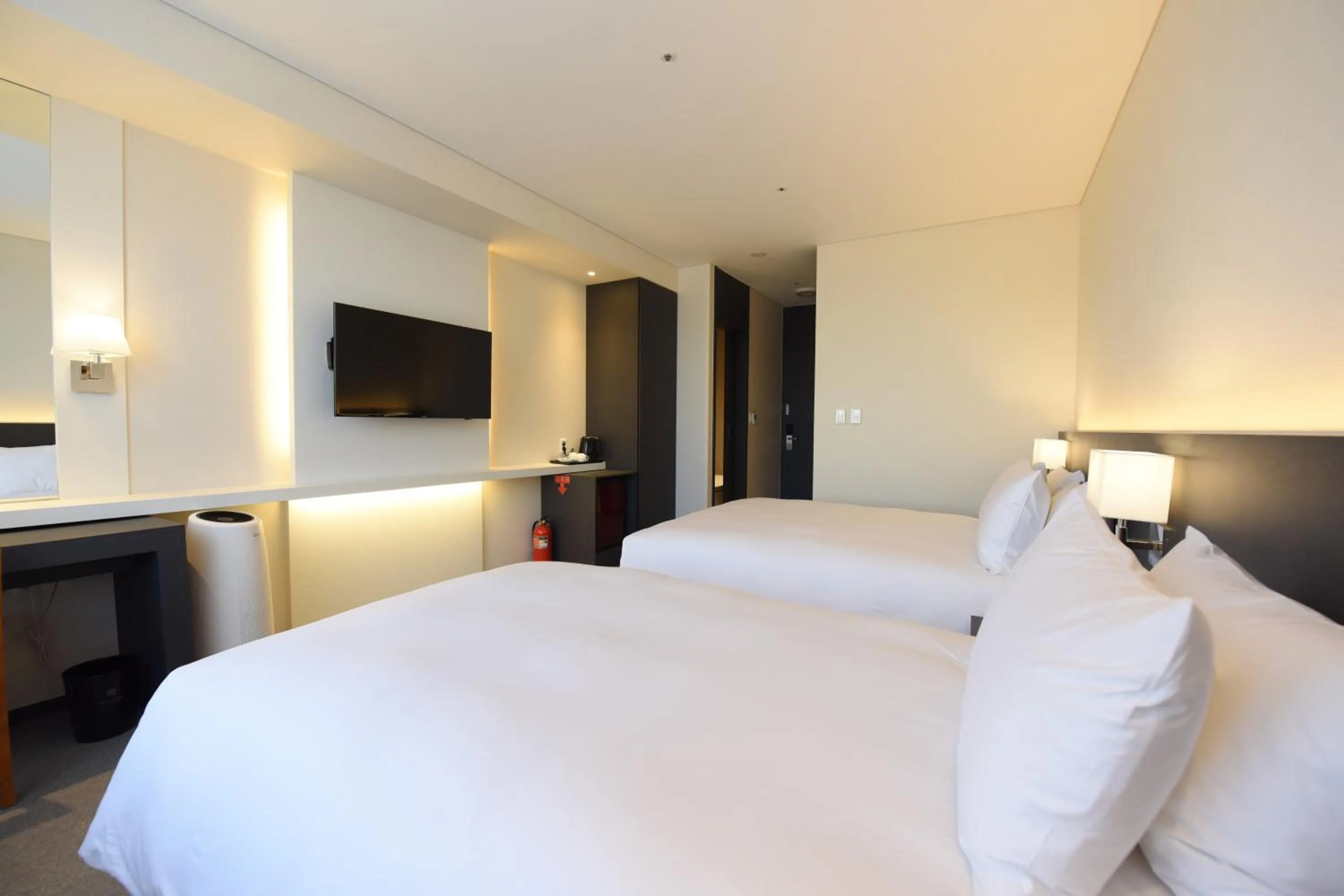 Bed in Geoje Artnouveau Suite Hotel