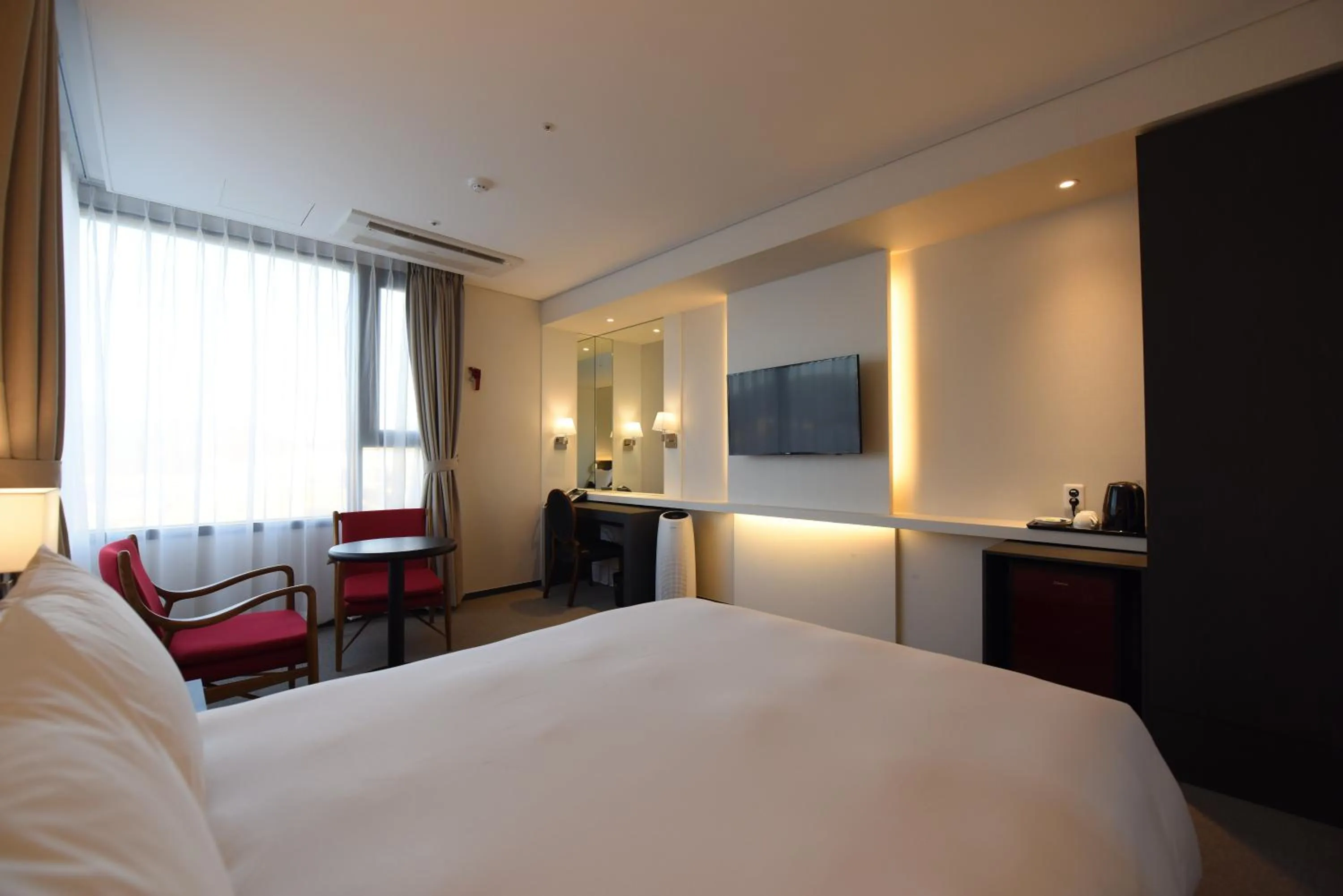 Bed in Geoje Artnouveau Suite Hotel