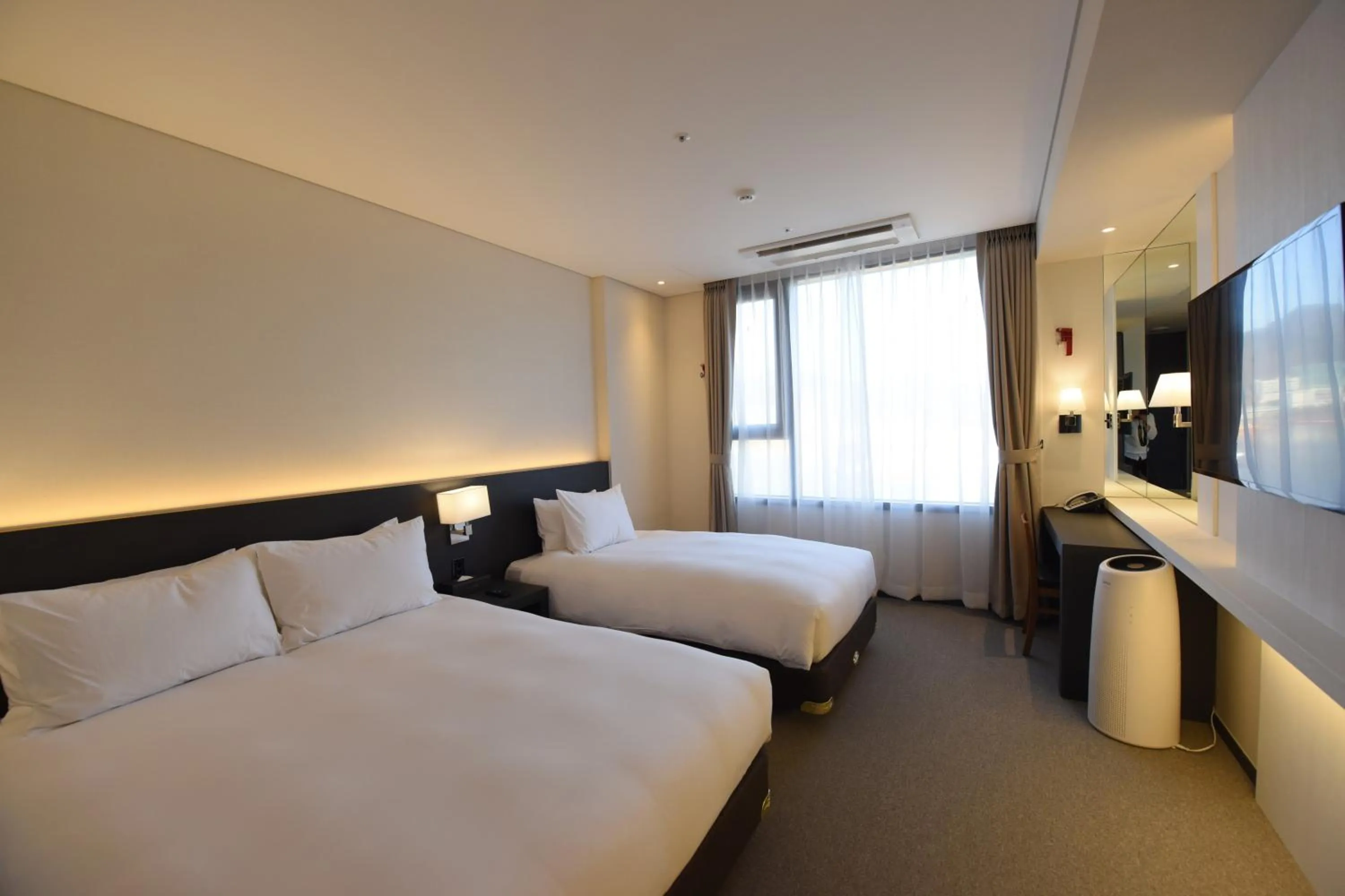 Bed in Geoje Artnouveau Suite Hotel