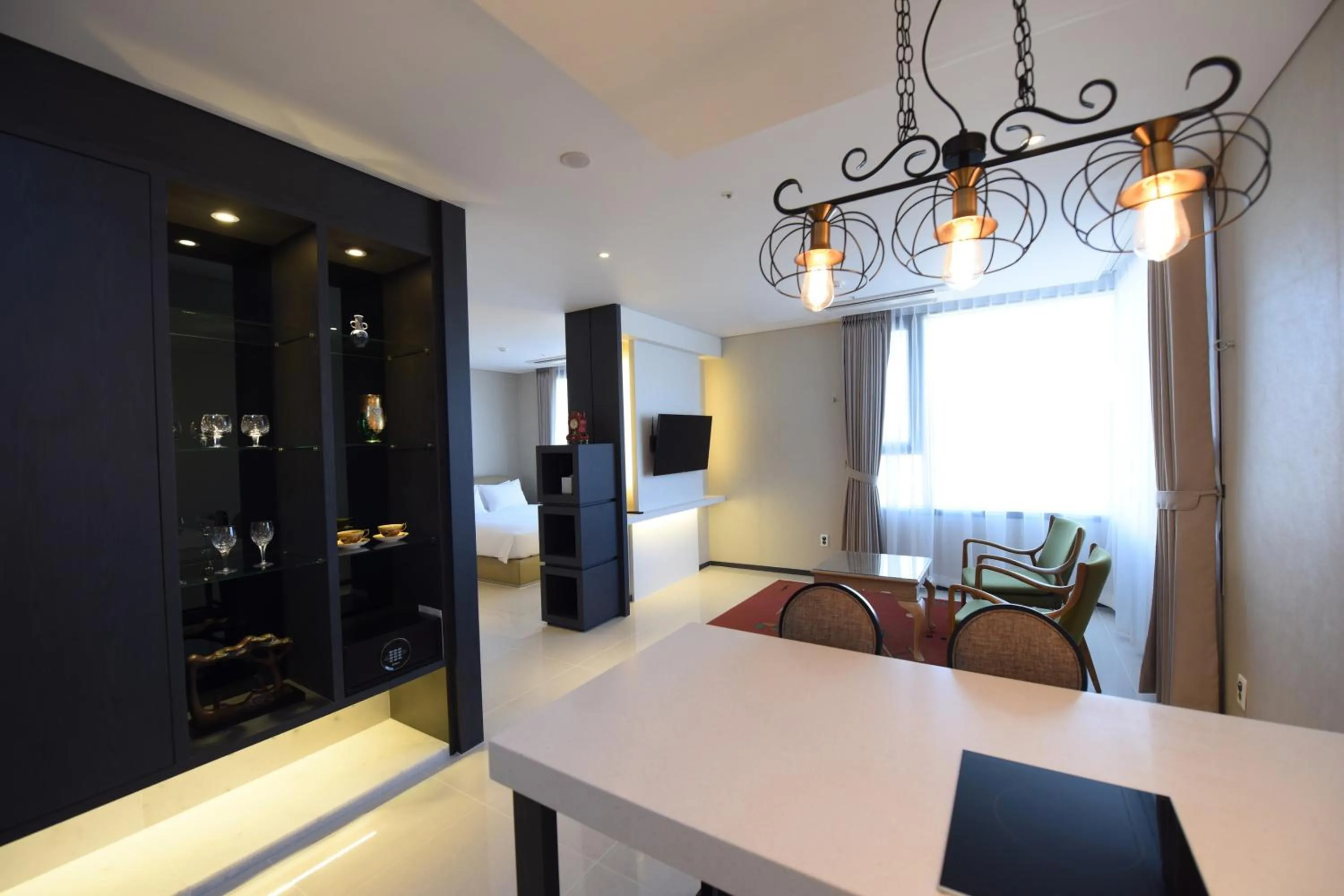 Living room, Bed in Geoje Artnouveau Suite Hotel