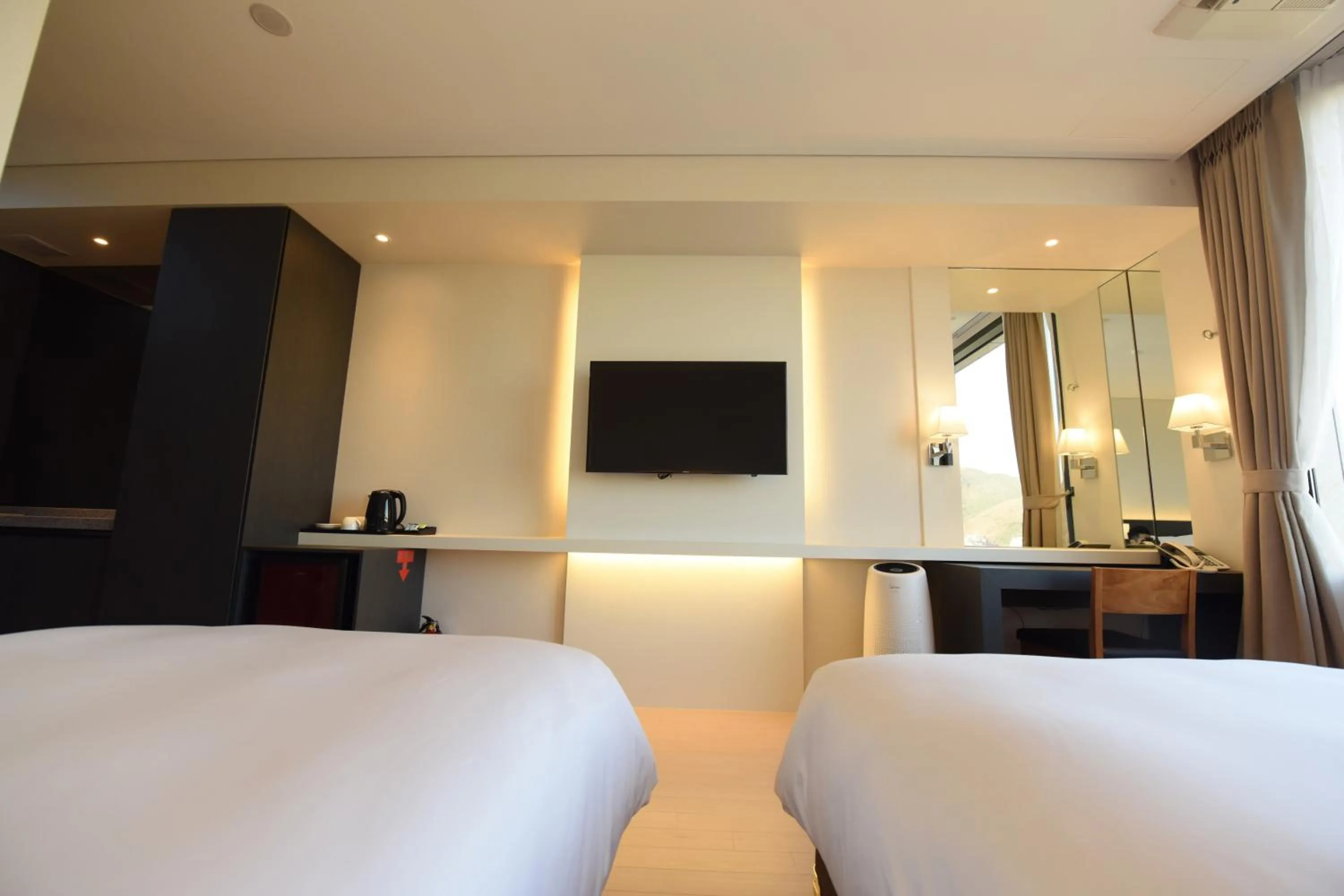 Bed in Geoje Artnouveau Suite Hotel