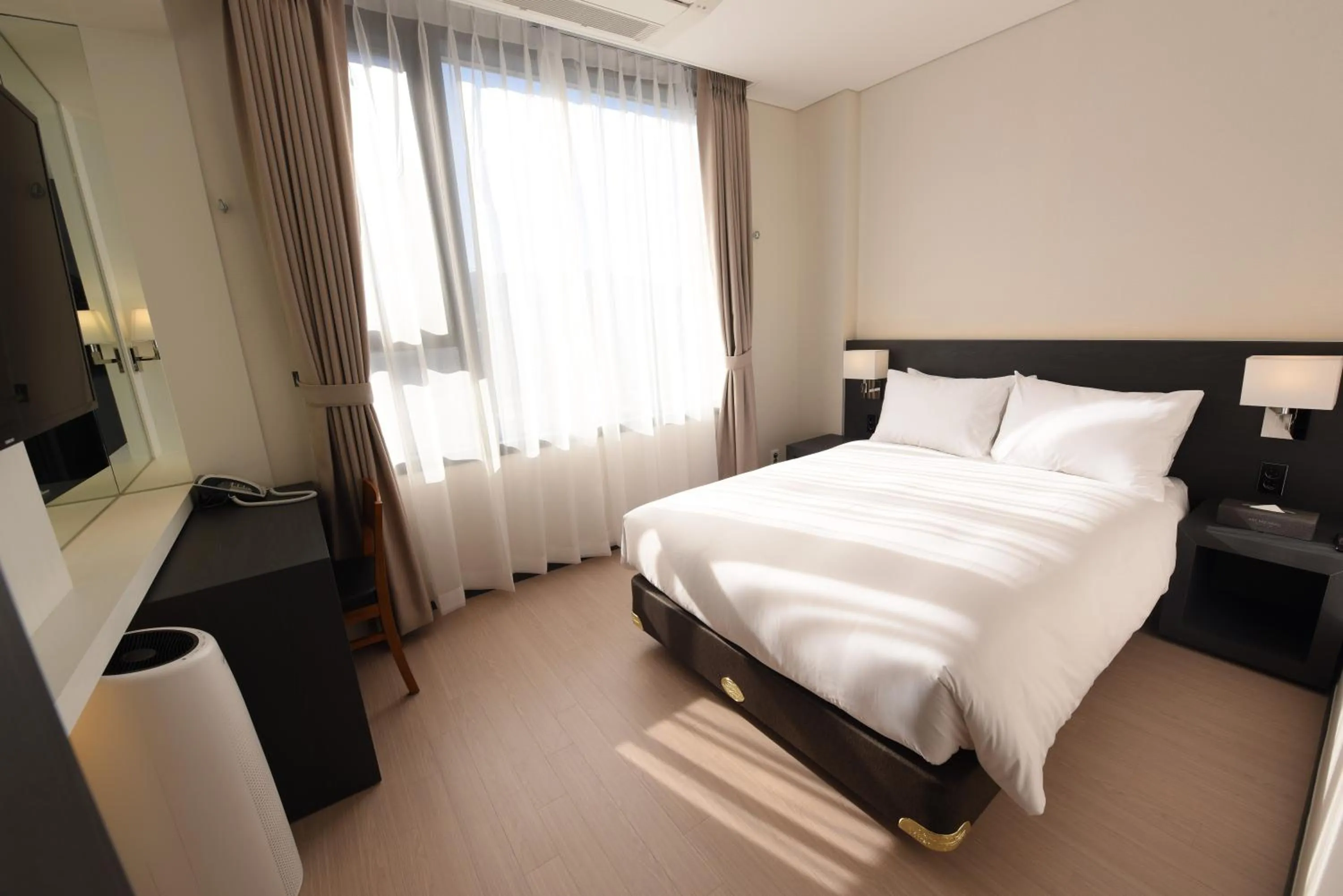 Bed in Geoje Artnouveau Suite Hotel