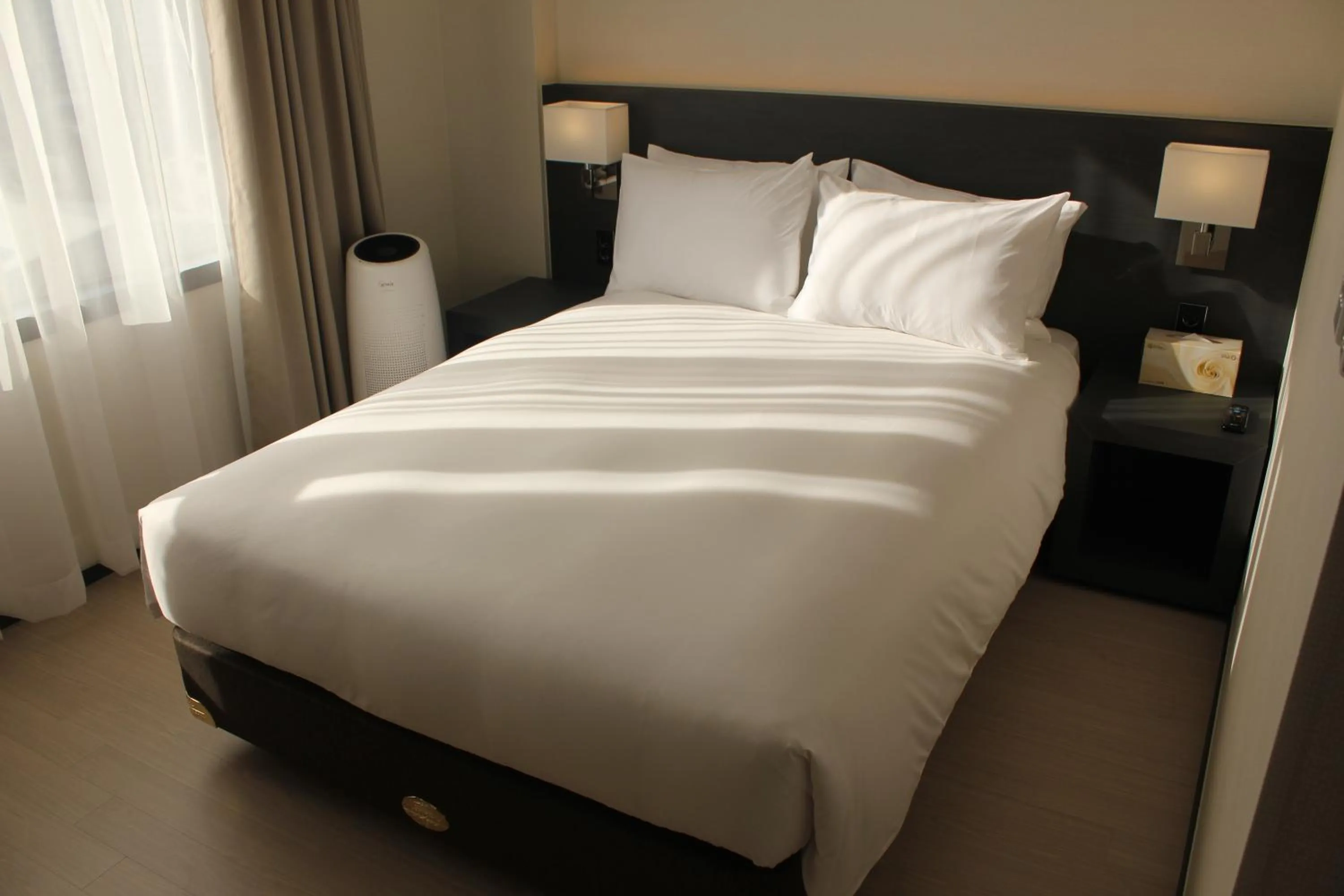 Bed in Geoje Artnouveau Suite Hotel