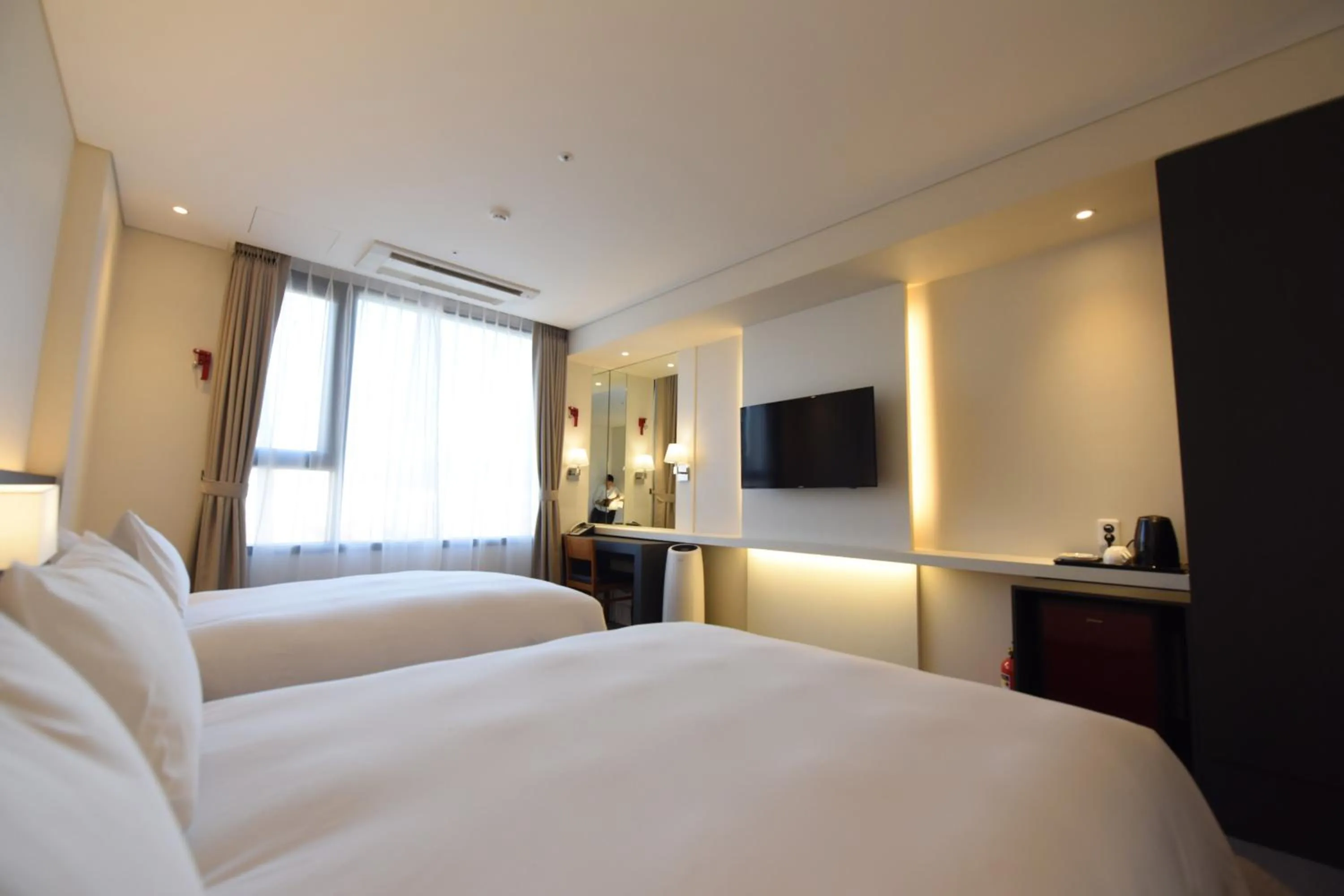 Bed in Geoje Artnouveau Suite Hotel