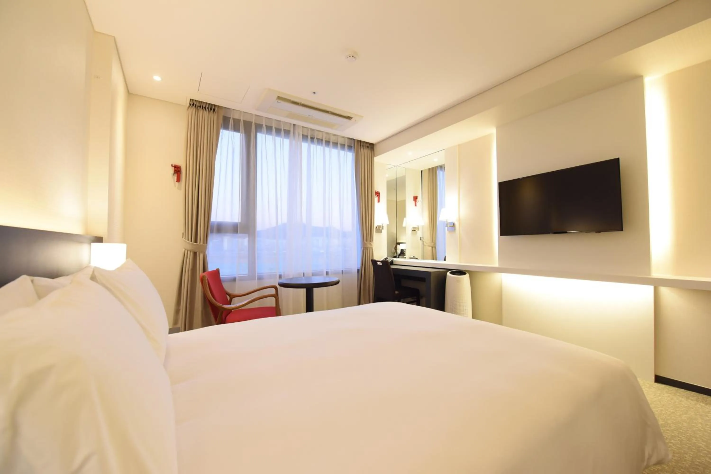 Bed in Geoje Artnouveau Suite Hotel