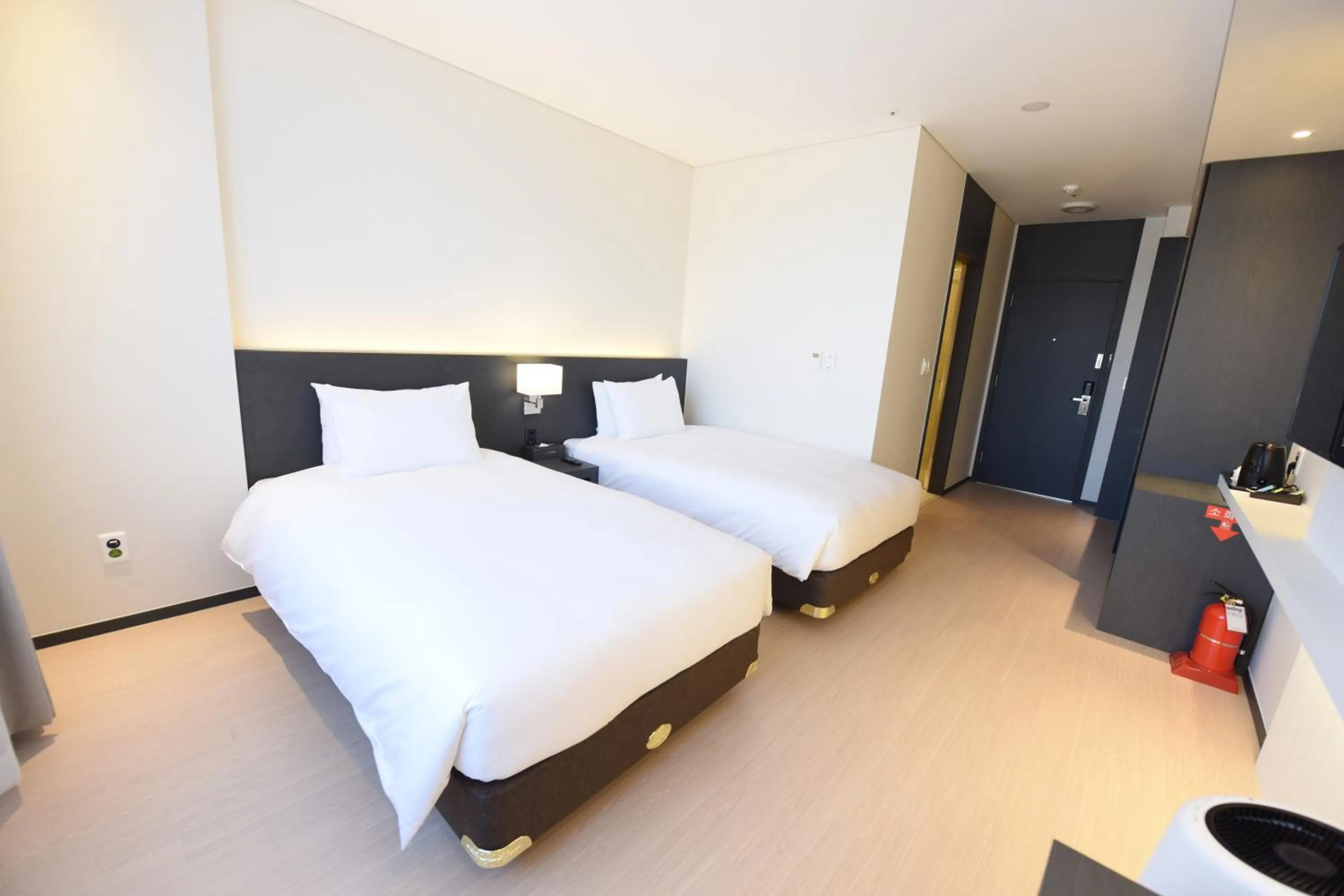 Bed in Geoje Artnouveau Suite Hotel