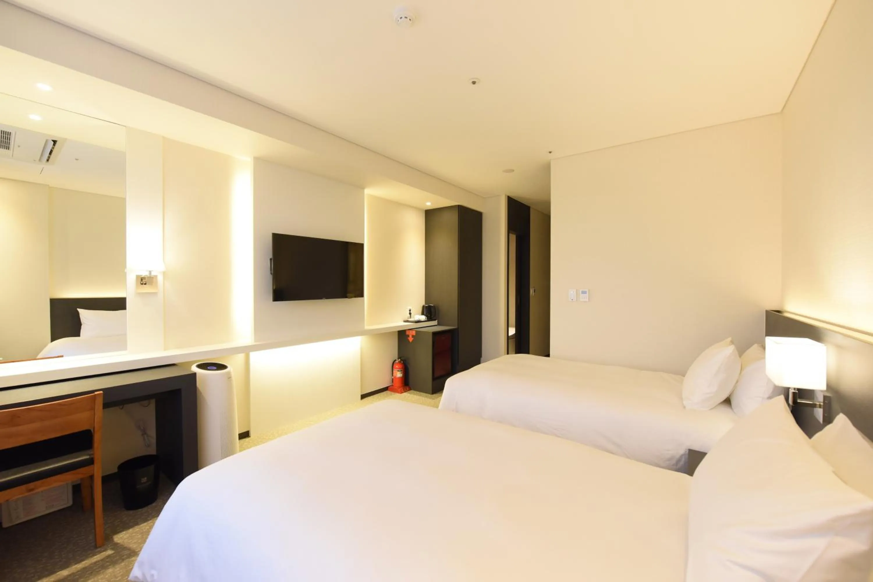 Bed in Geoje Artnouveau Suite Hotel