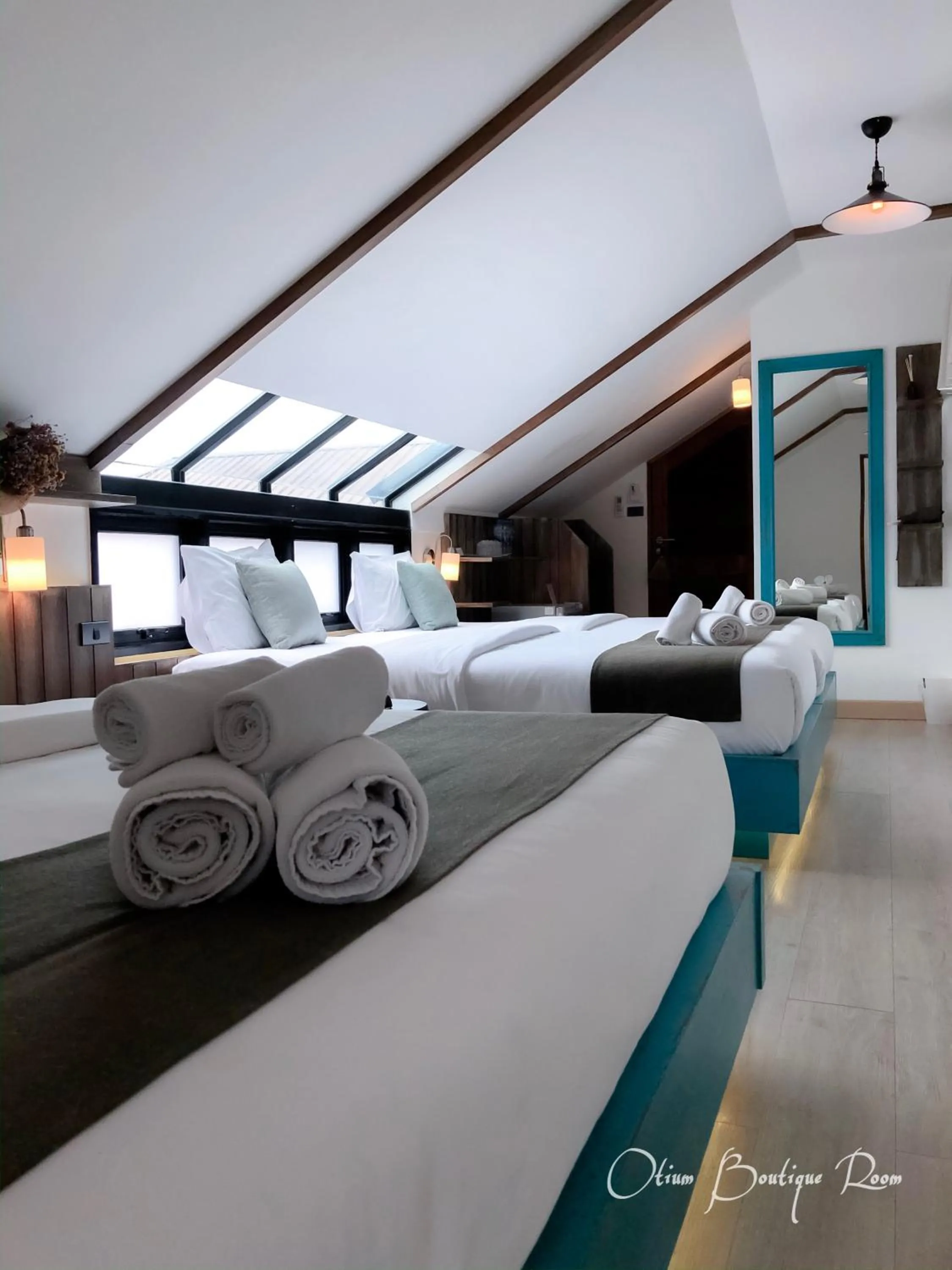 Bed in Otium Boutique Room
