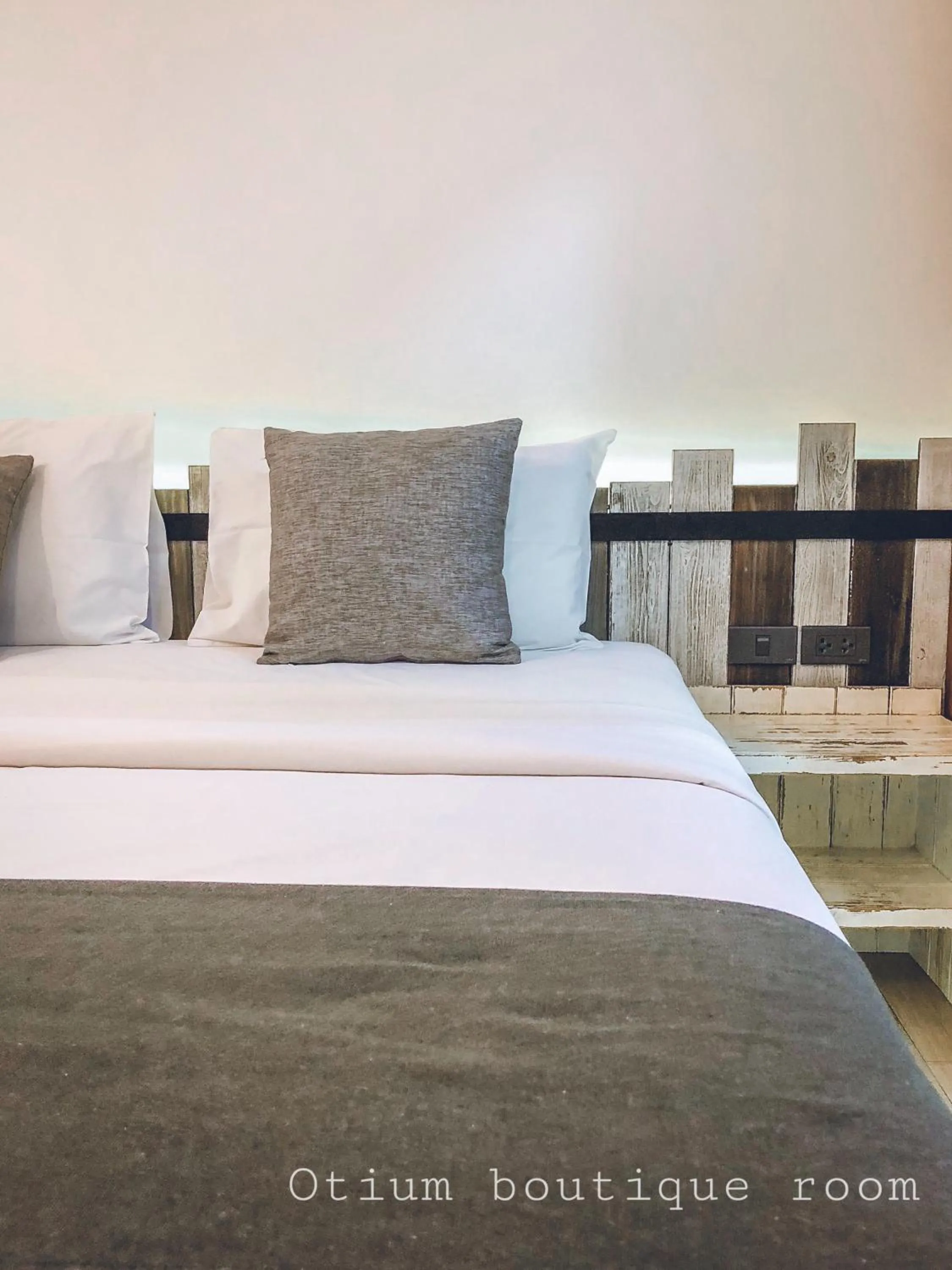 Bed in Otium Boutique Room