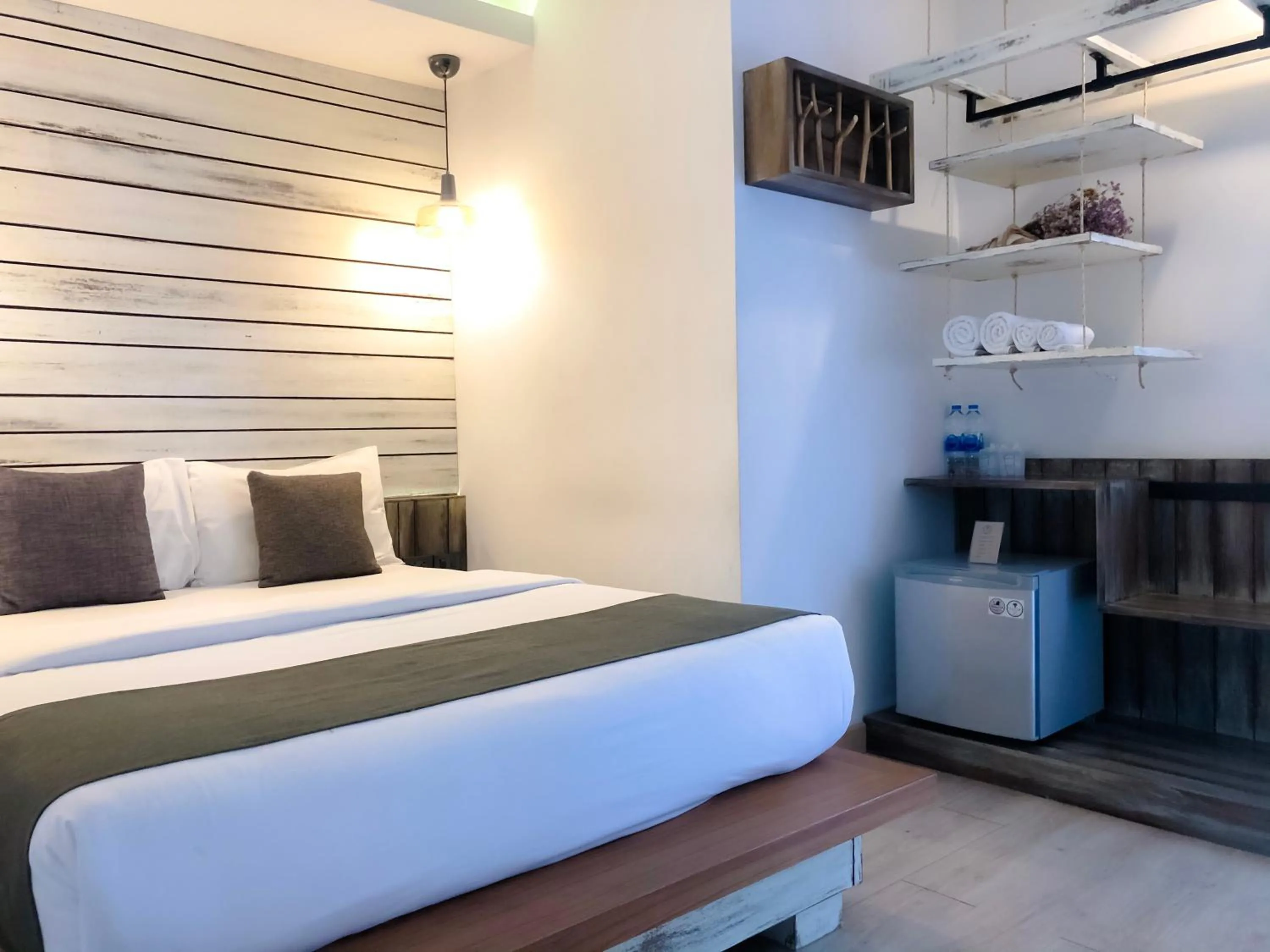 Bed in Otium Boutique Room