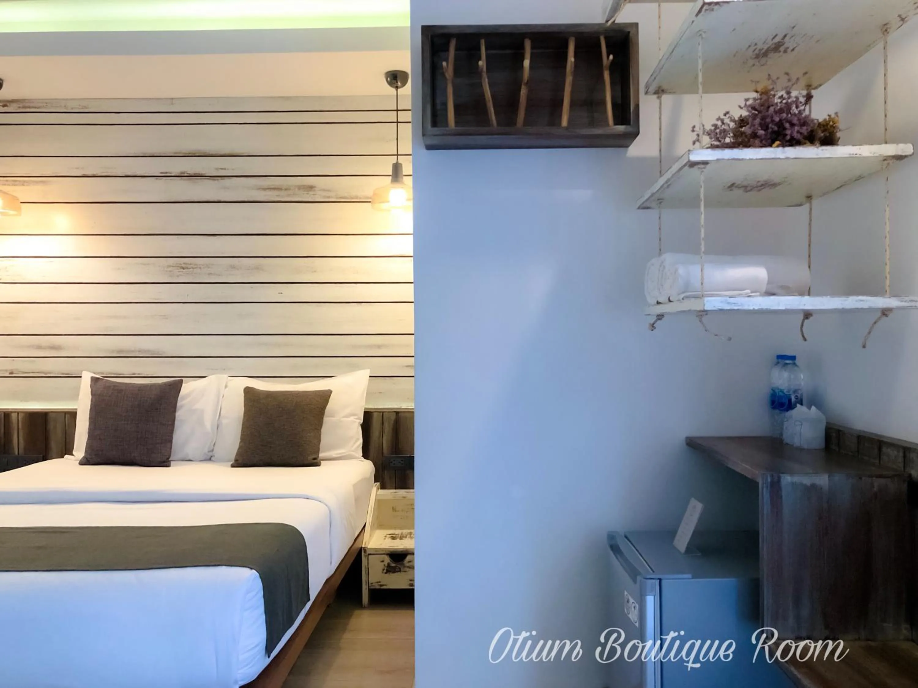 Bed in Otium Boutique Room