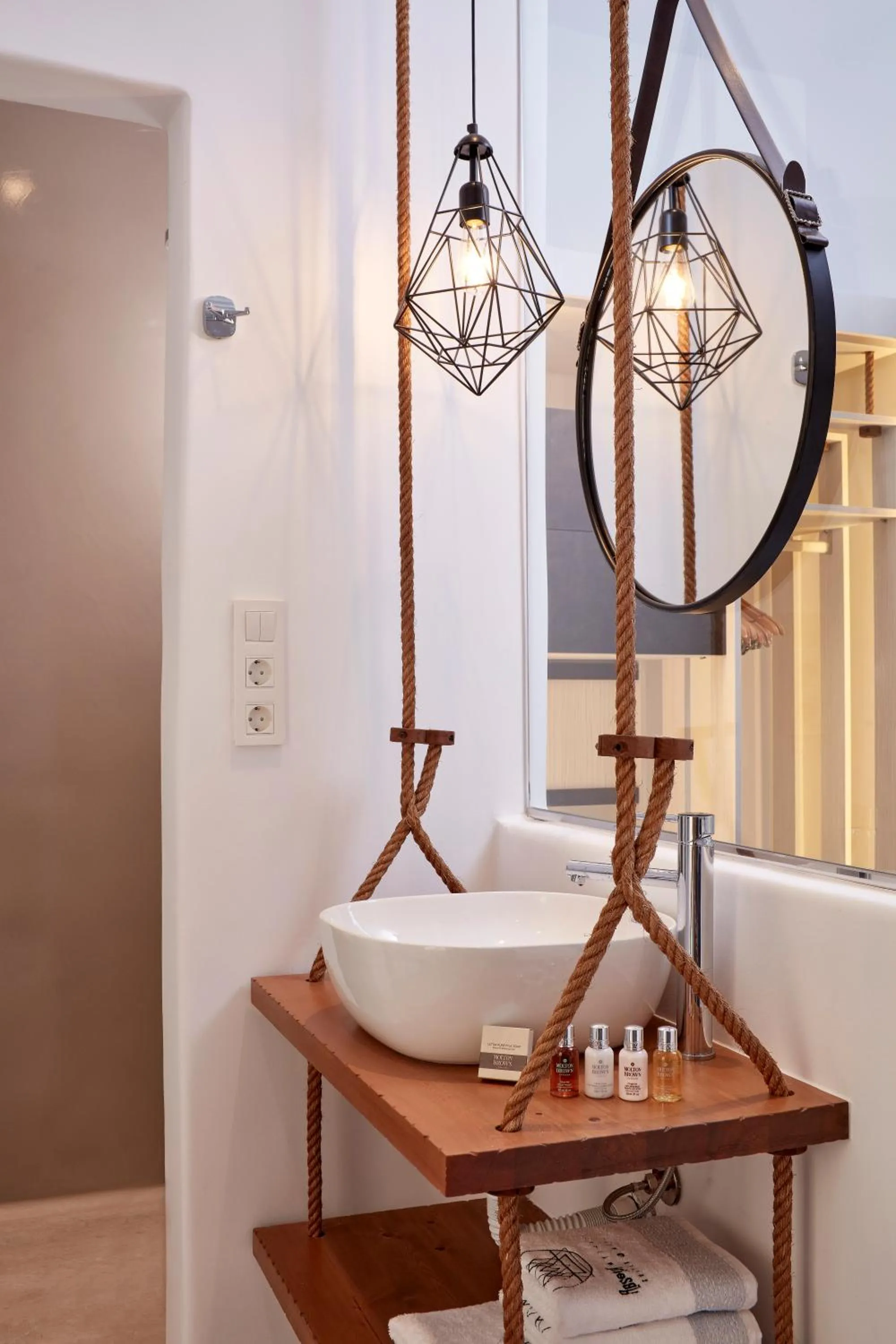 Toilet, Bed in Absolute Mykonos Suites & More