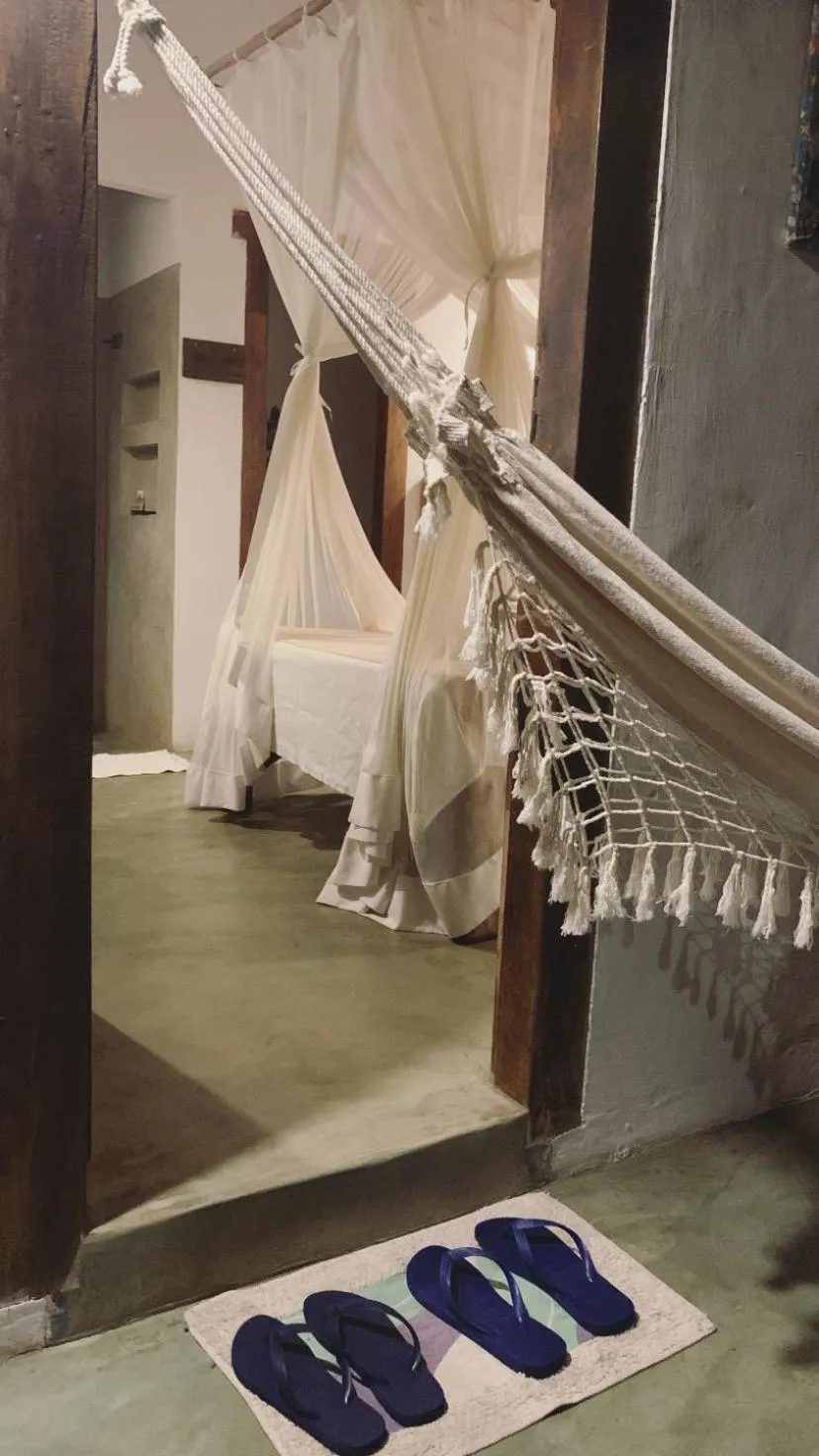 Bed in Pousada Spa Oasis