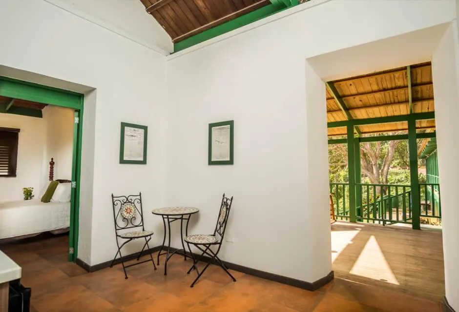 Seating area, Bed in Hacienda Juanita