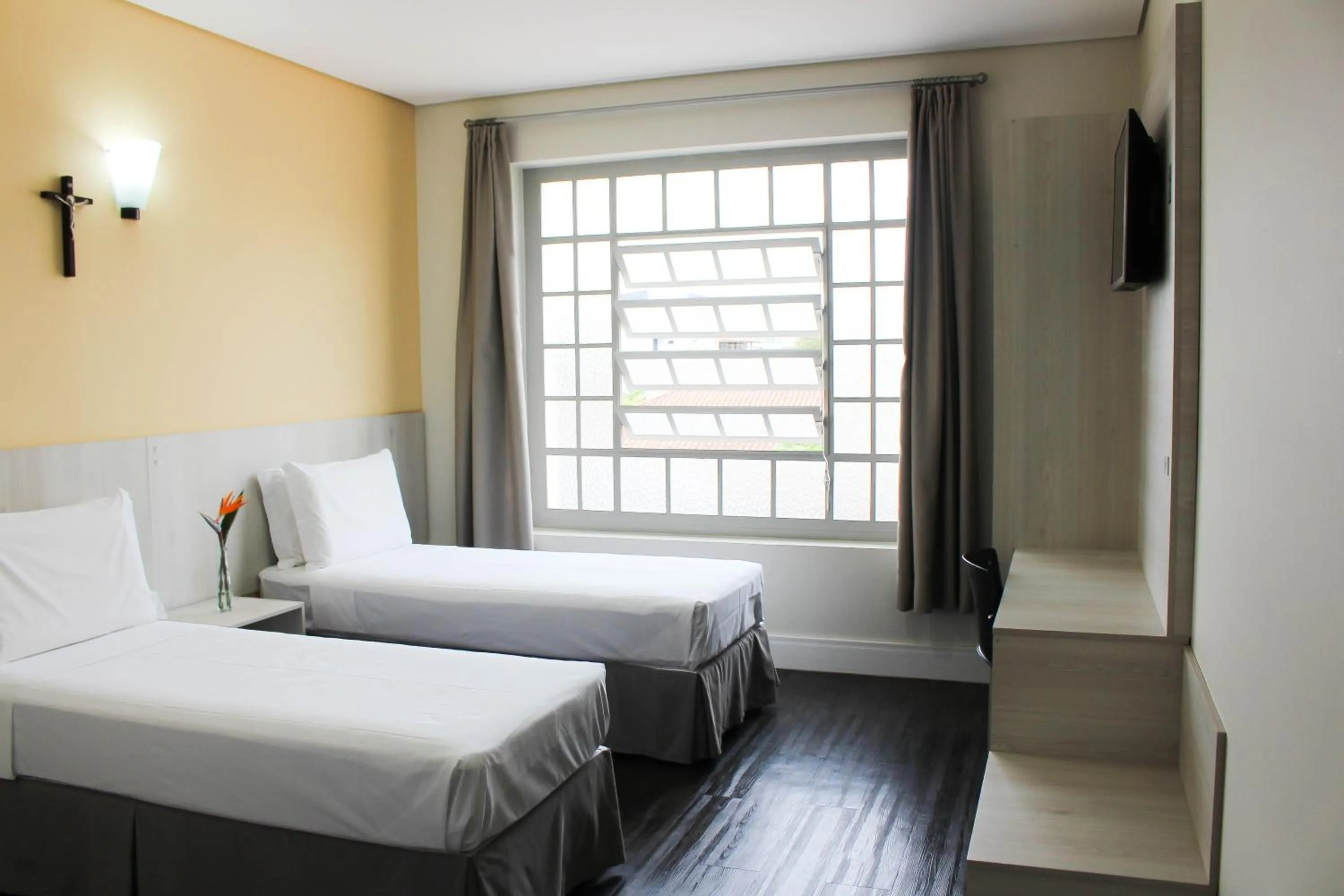 Bed in CEIC Pousada e Eventos