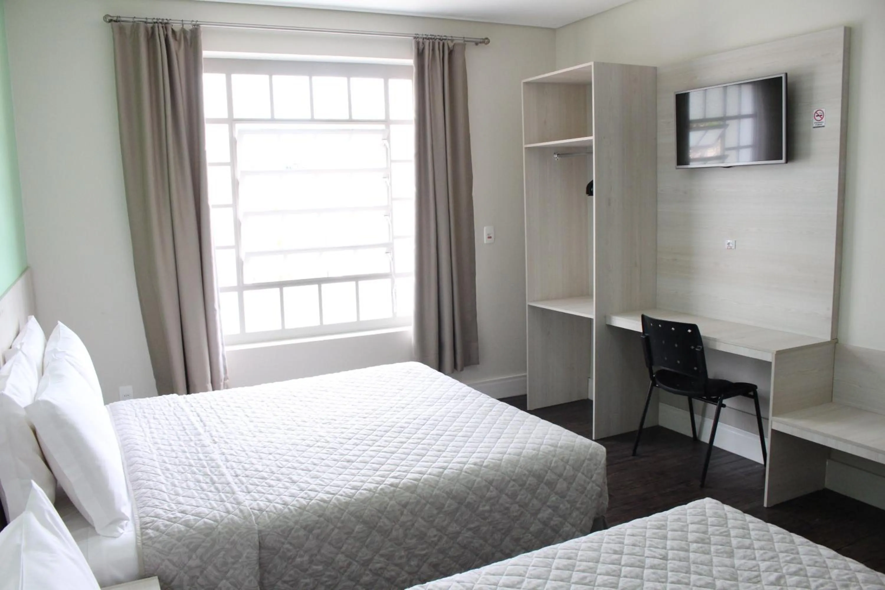 Bed in CEIC Pousada e Eventos