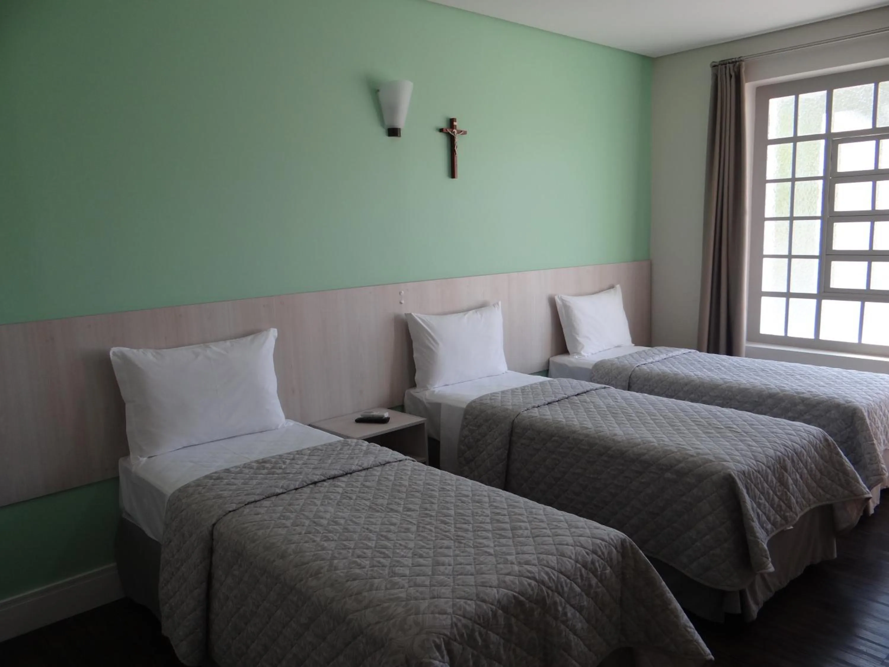 Bed in CEIC Pousada e Eventos