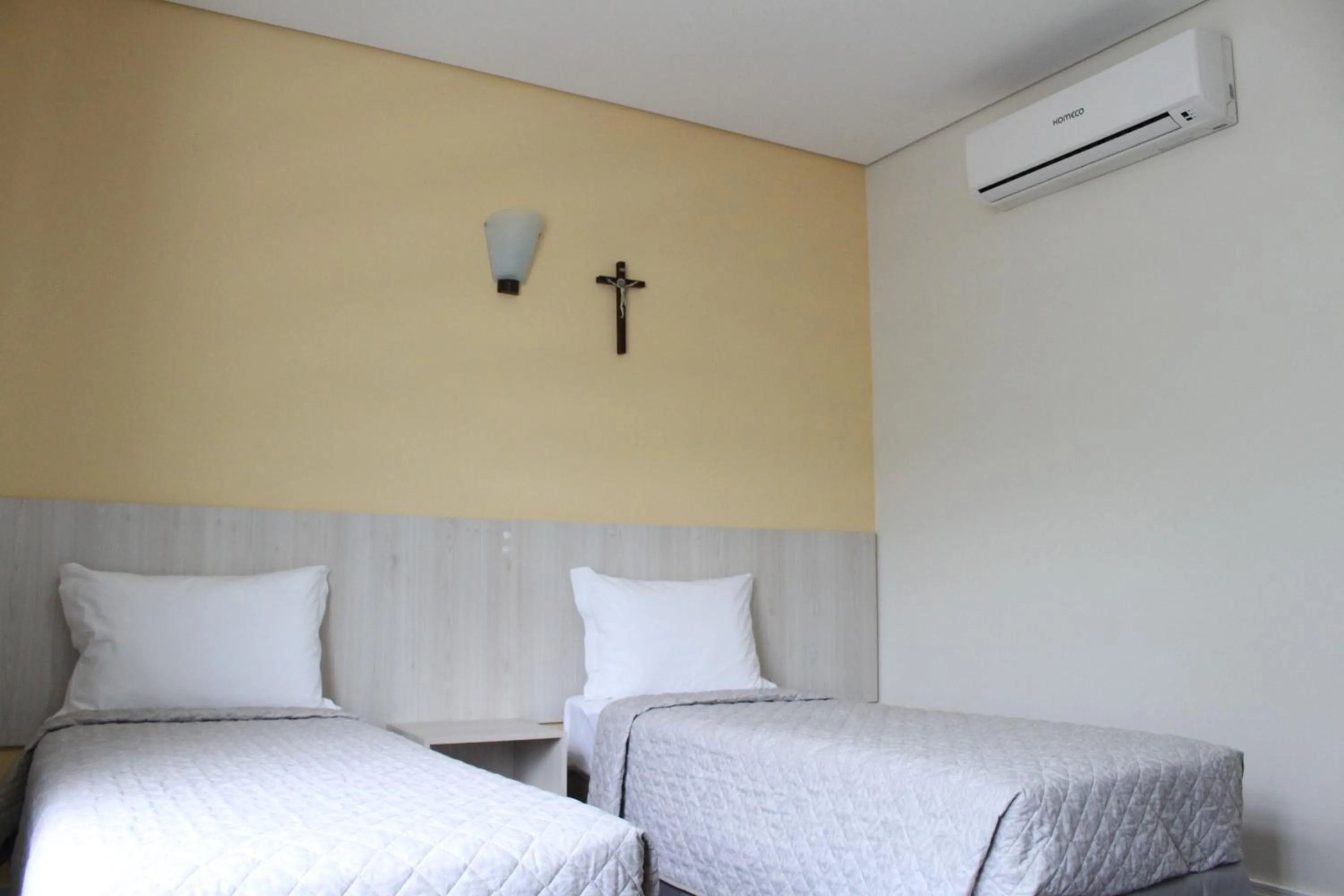 Bed in CEIC Pousada e Eventos