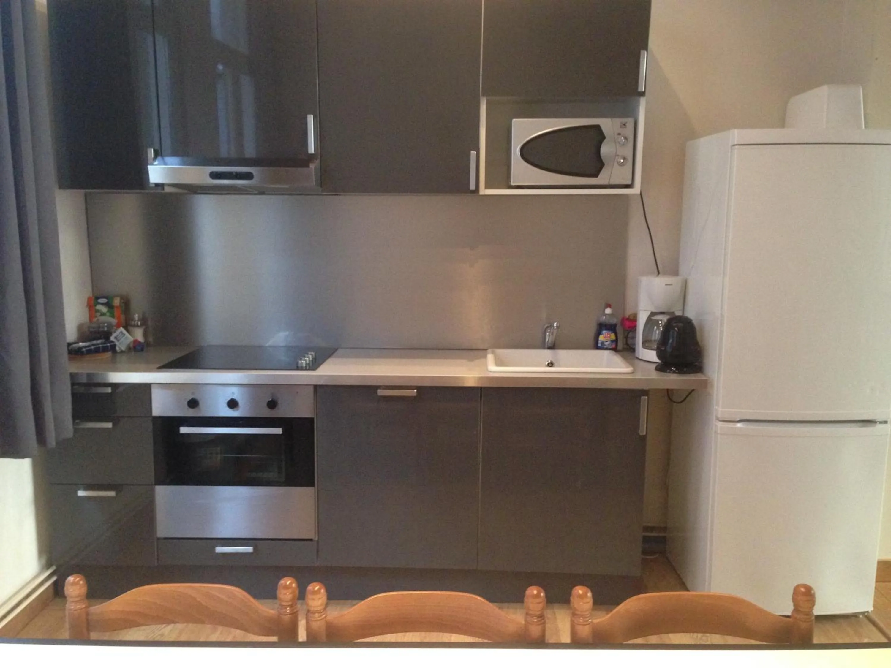 Kitchen or kitchenette in Rentbynight Aparthotel