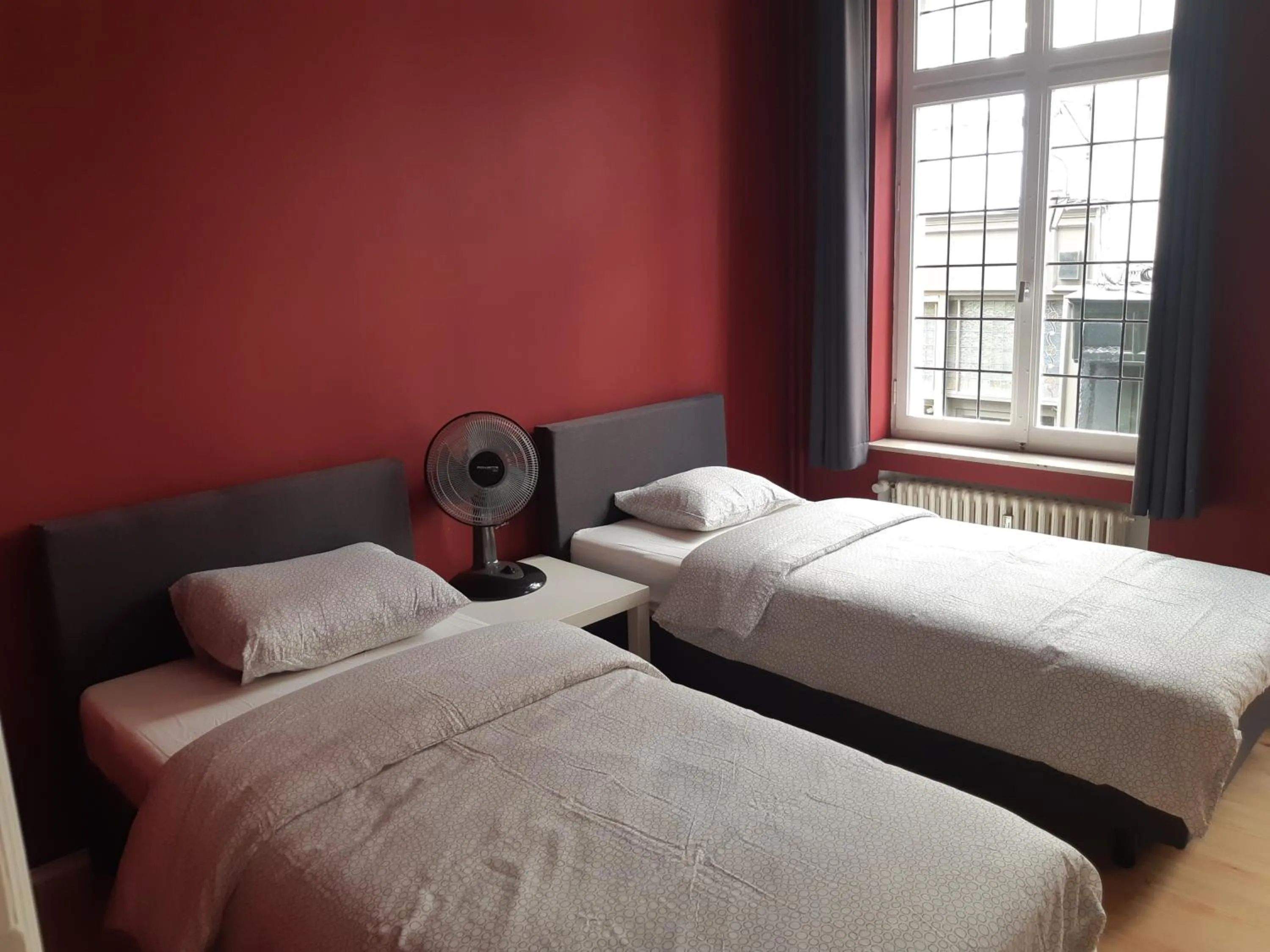 Bed in Rentbynight Aparthotel