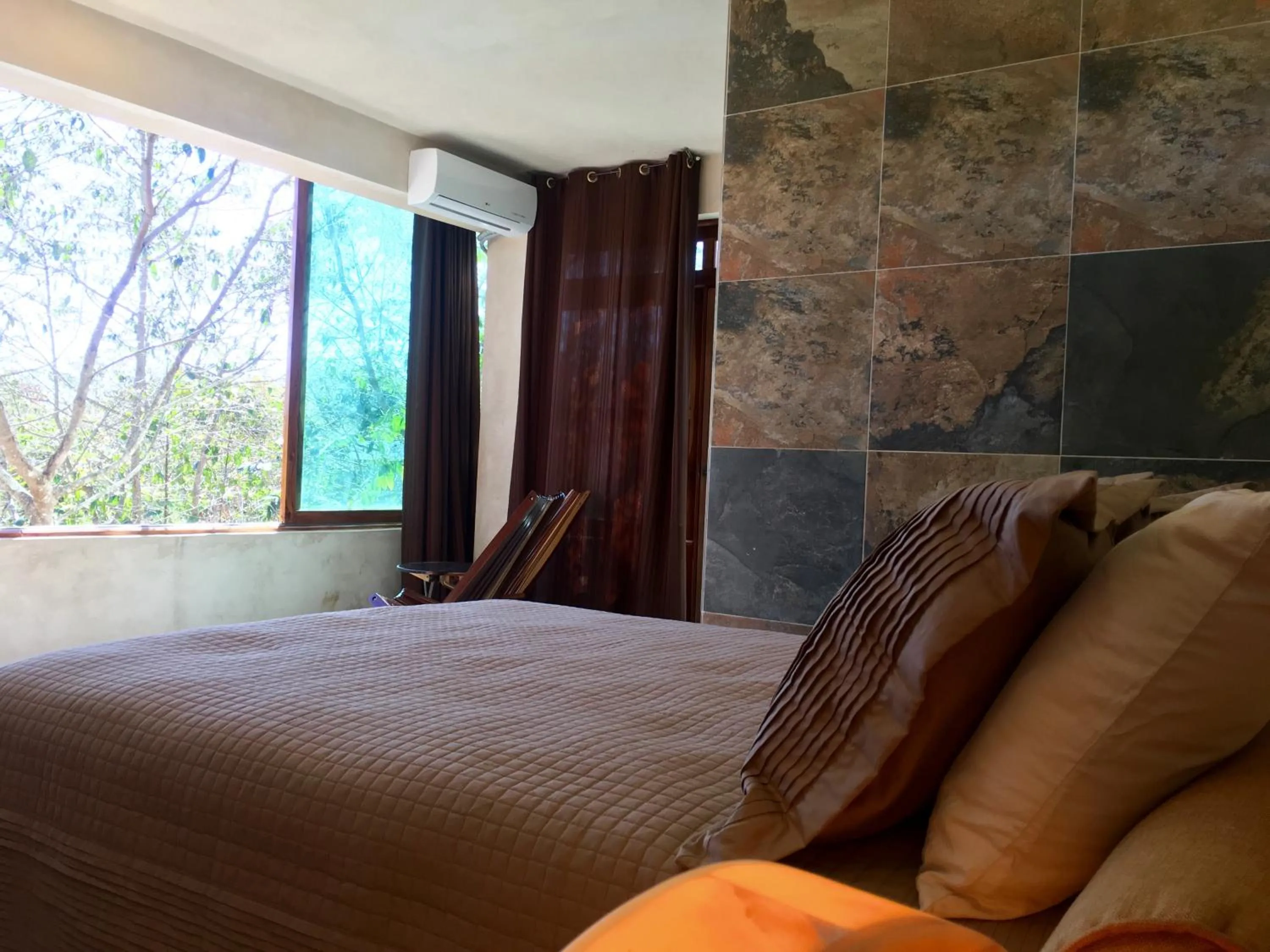 Bed in Hotel Casa Maya Calakmul