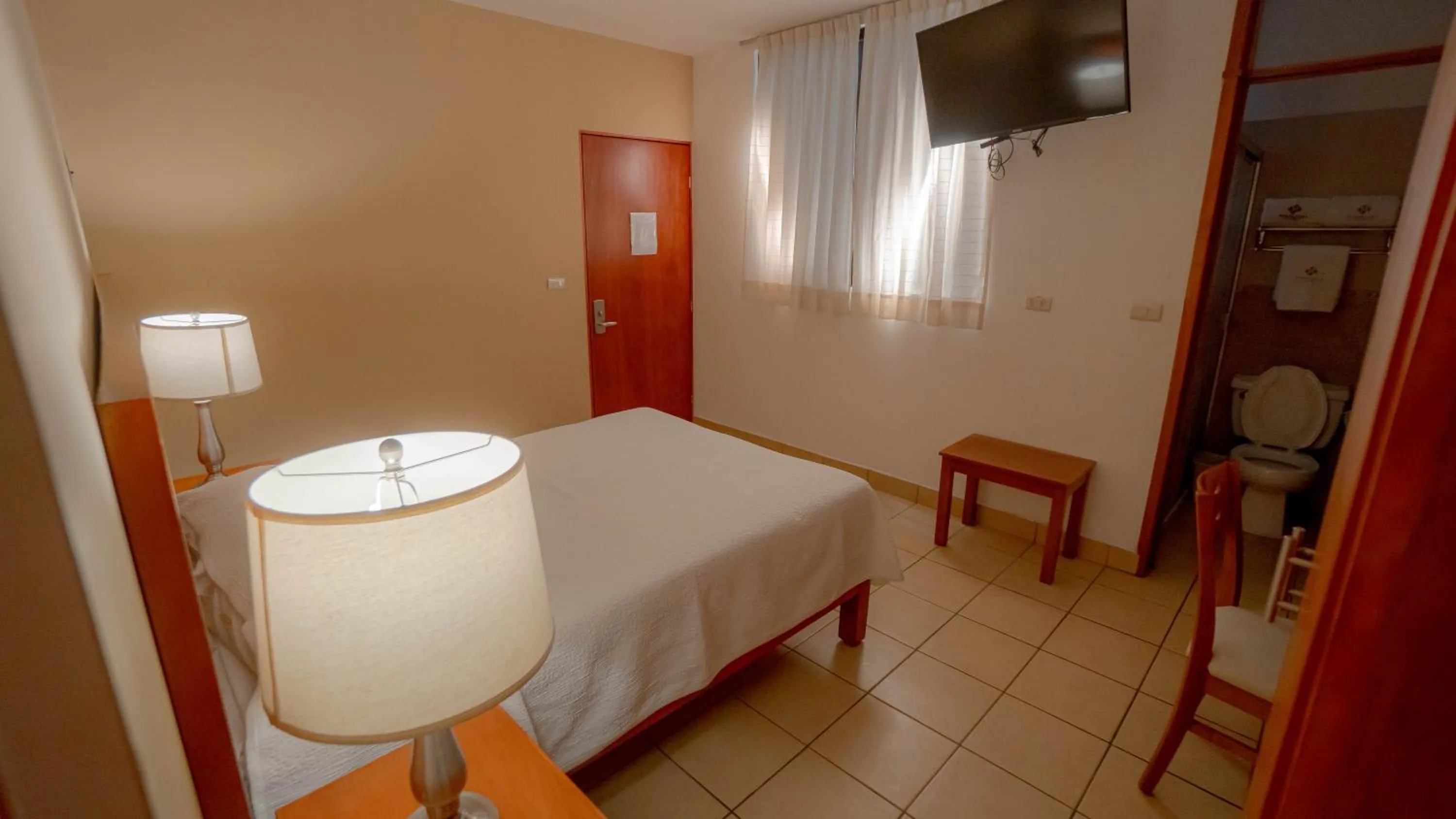 Bed in Hotel Marllou