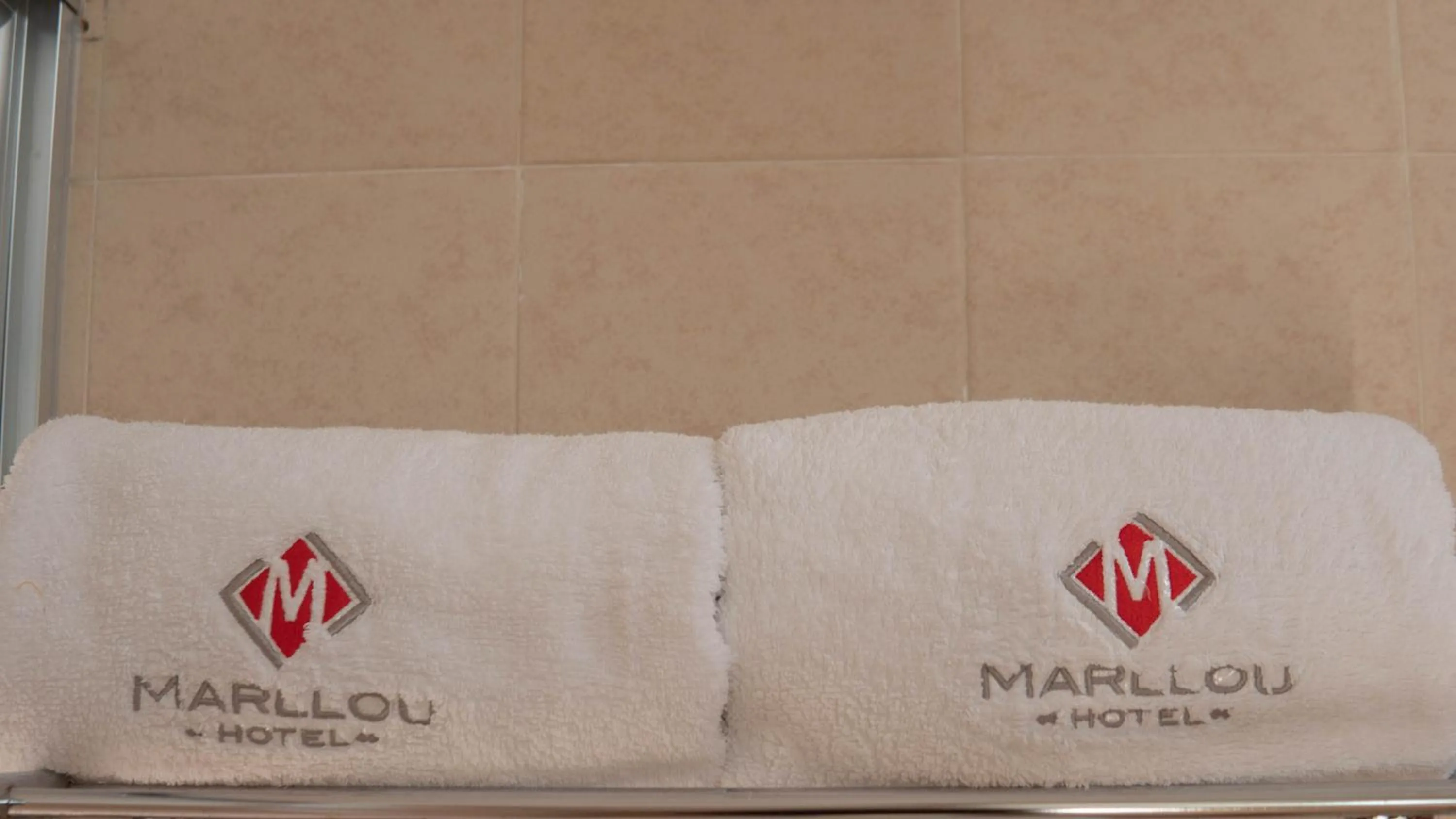 Bed in Hotel Marllou