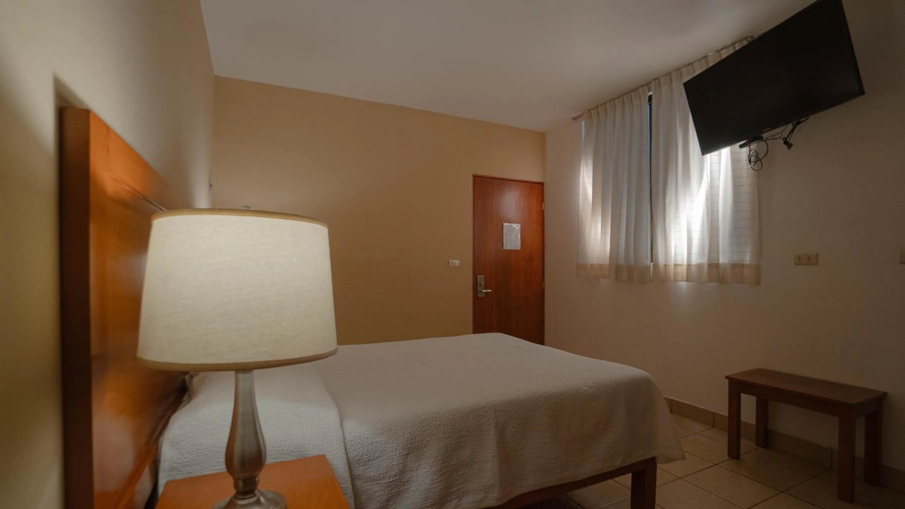 Bed in Hotel Marllou