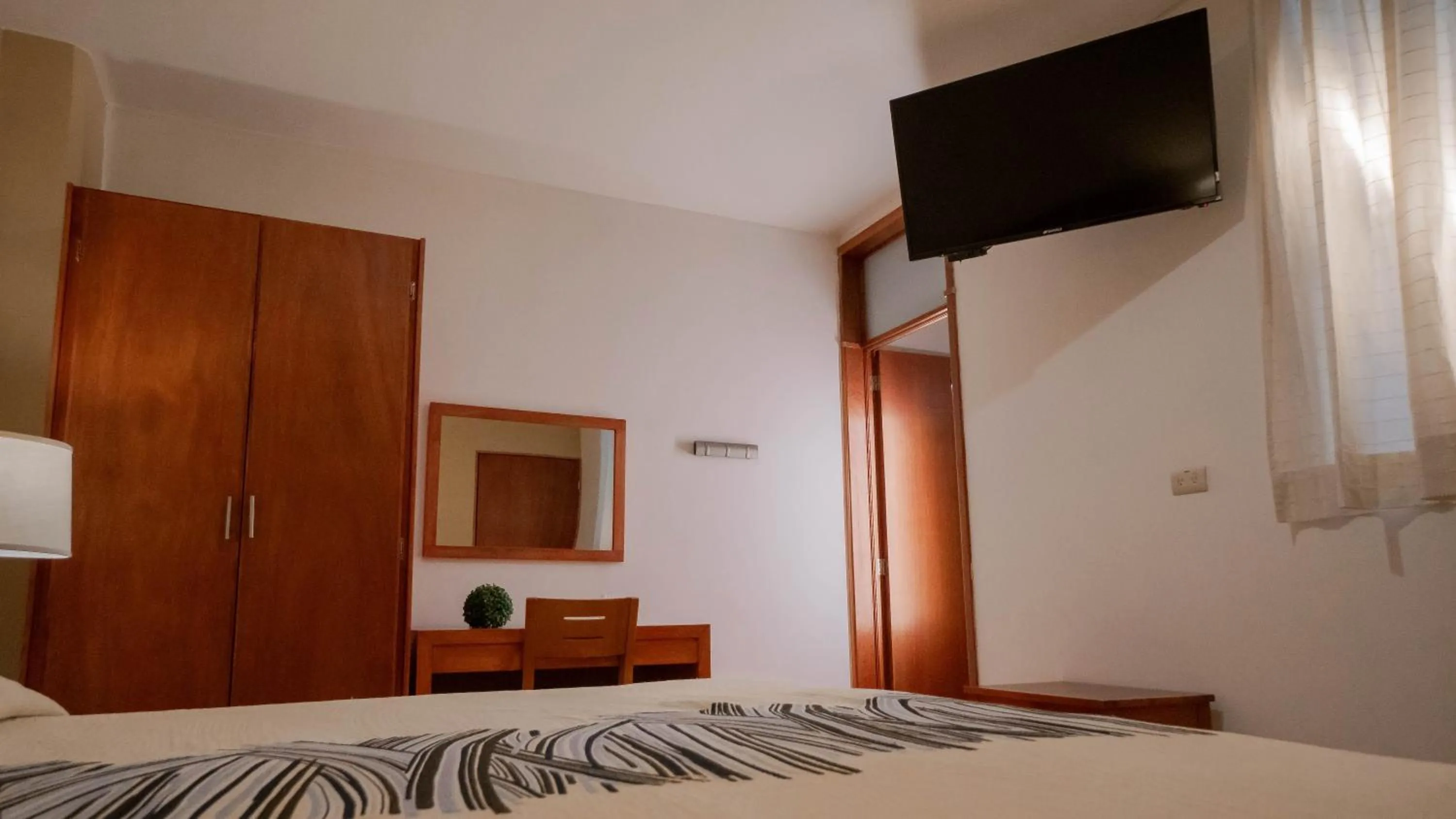 Bed in Hotel Marllou