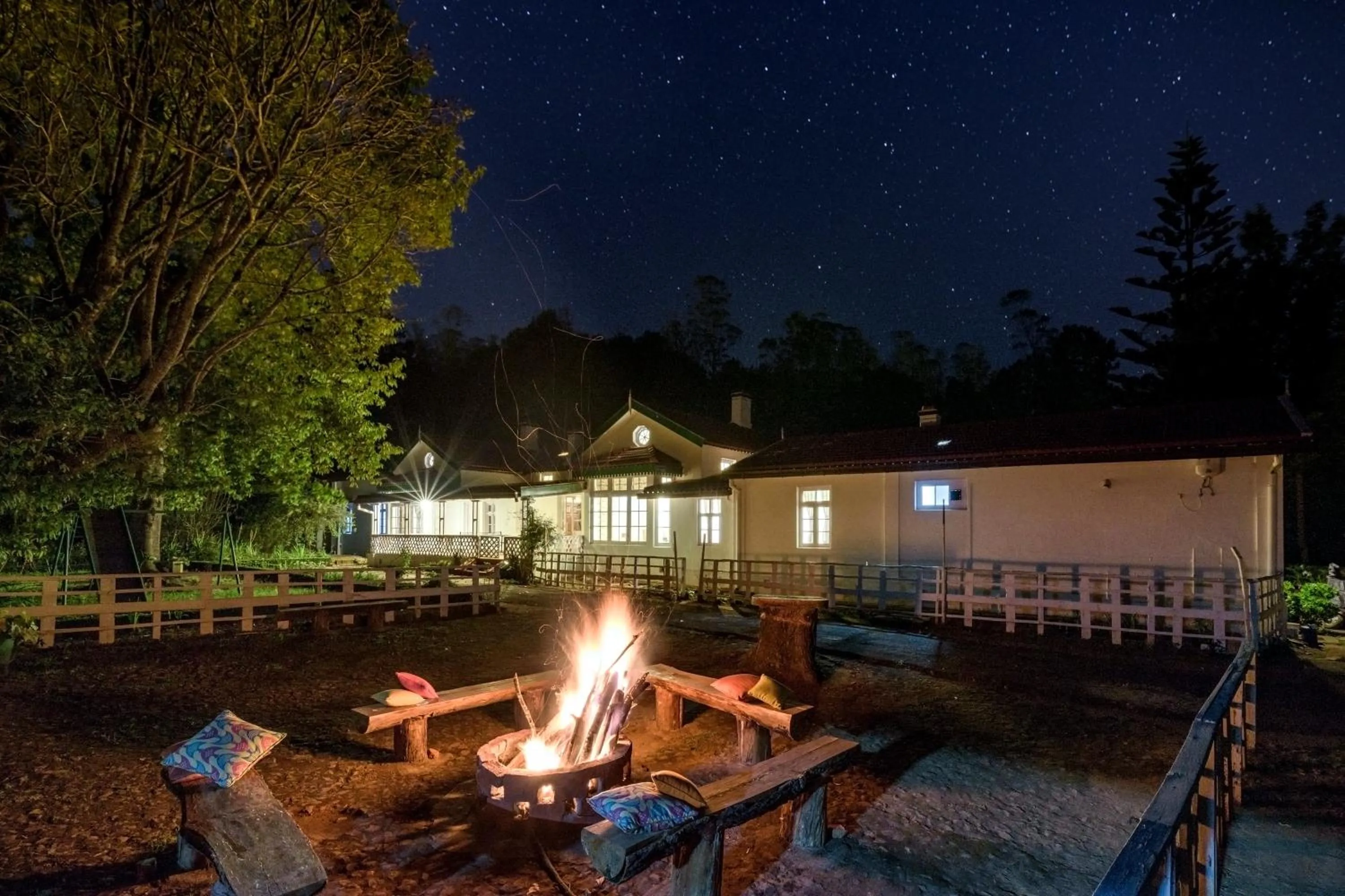 Night in SaffronStays Milton Abbott Estate - 2BR colonial-era bungalow with garden, golf course views & bonfire nights near Ooty Golf Club