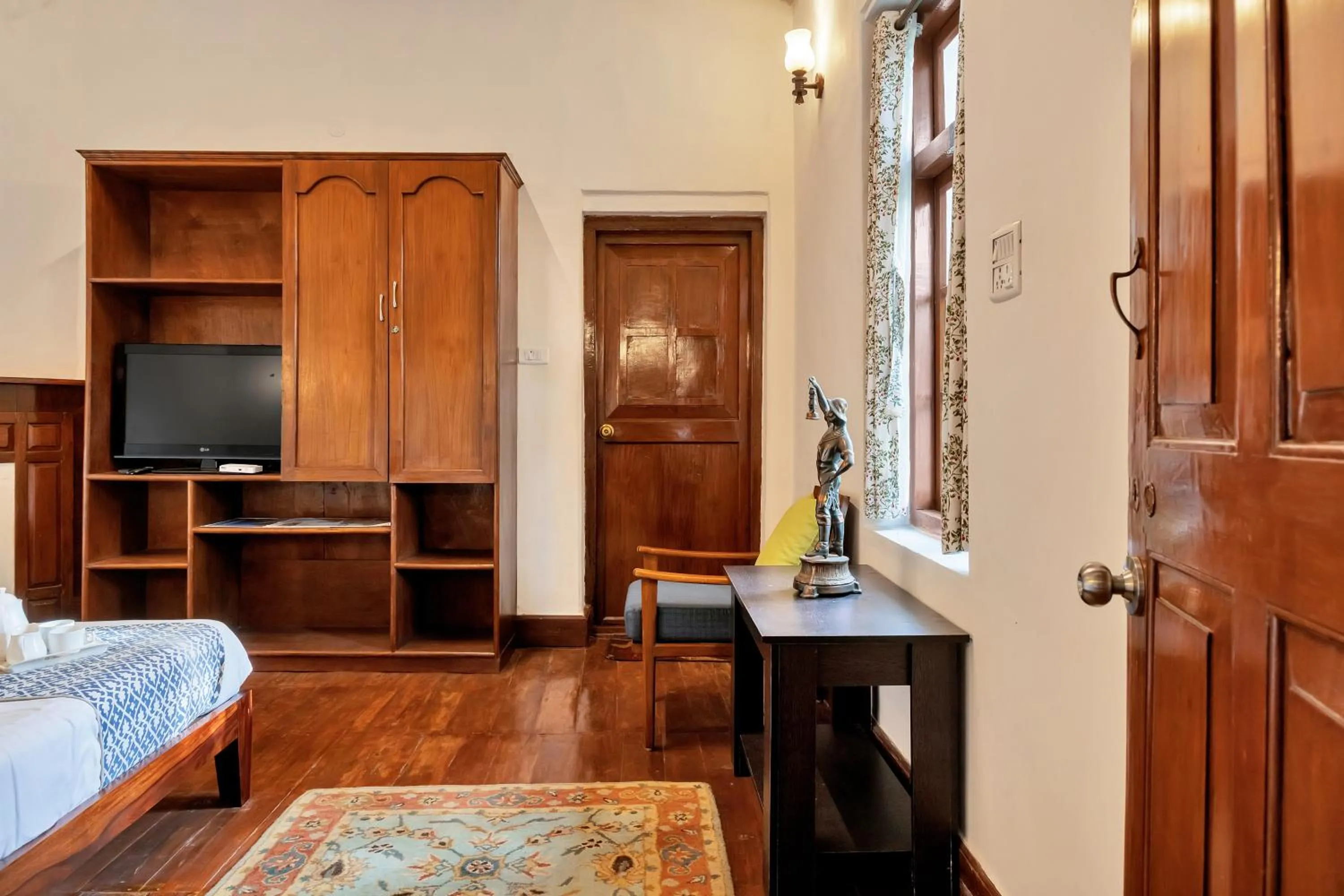 Bed in SaffronStays Milton Abbott Estate - 2BR colonial-era bungalow with garden, golf course views & bonfire nights near Ooty Golf Club