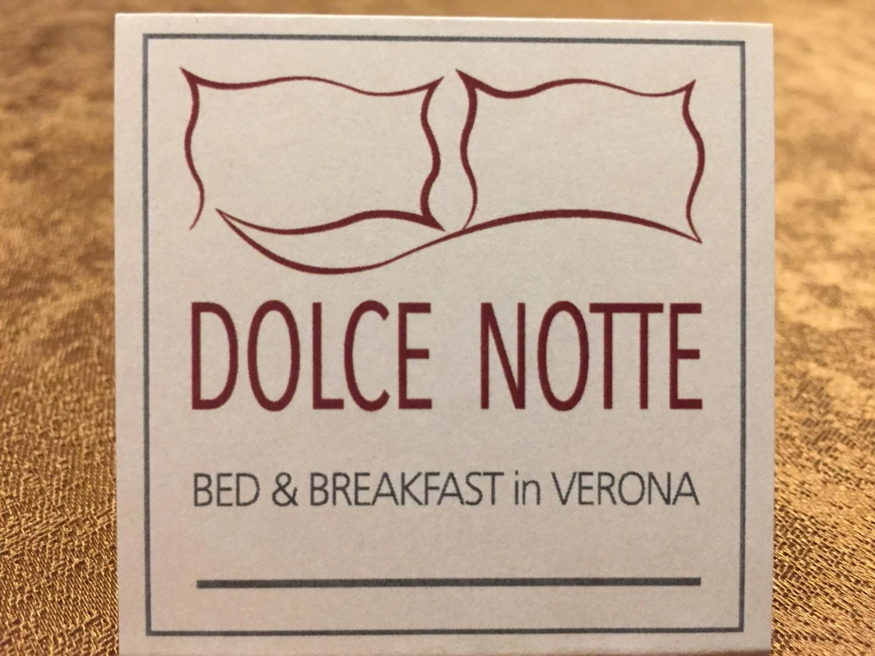 Property logo or sign in Dolce Notte