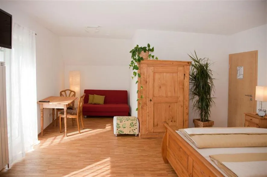 Seating area, Bed in " Zum alten Schlawiner "