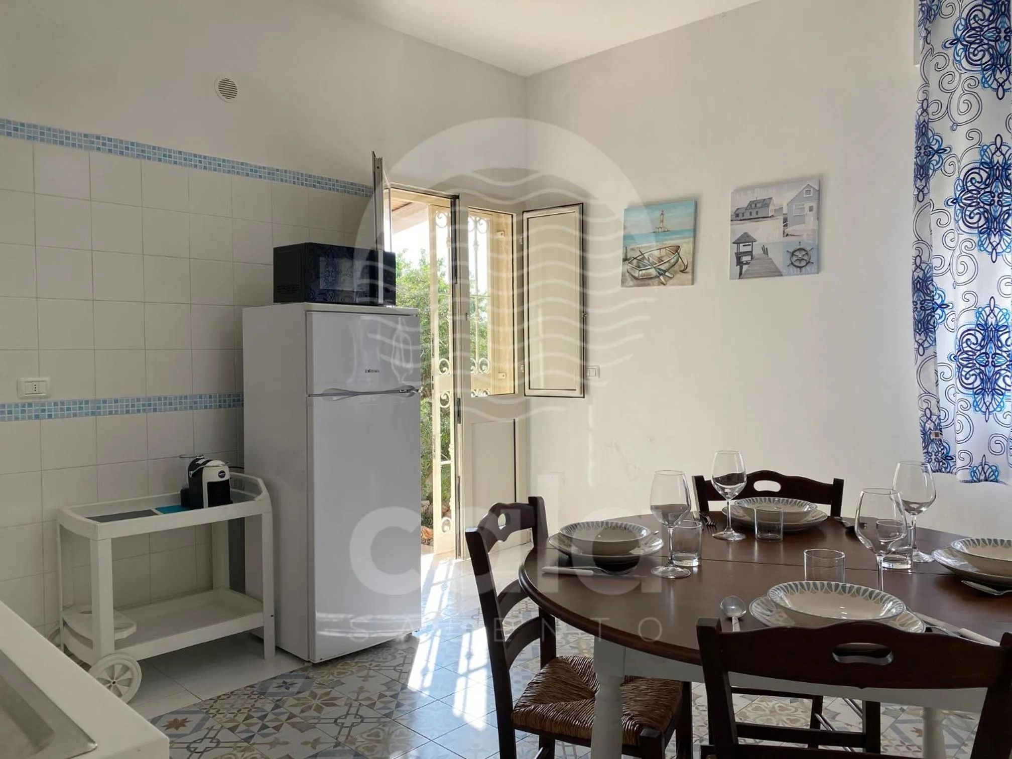 Kitchen or kitchenette in Villa Teresa - giardino privato By Cala Salento