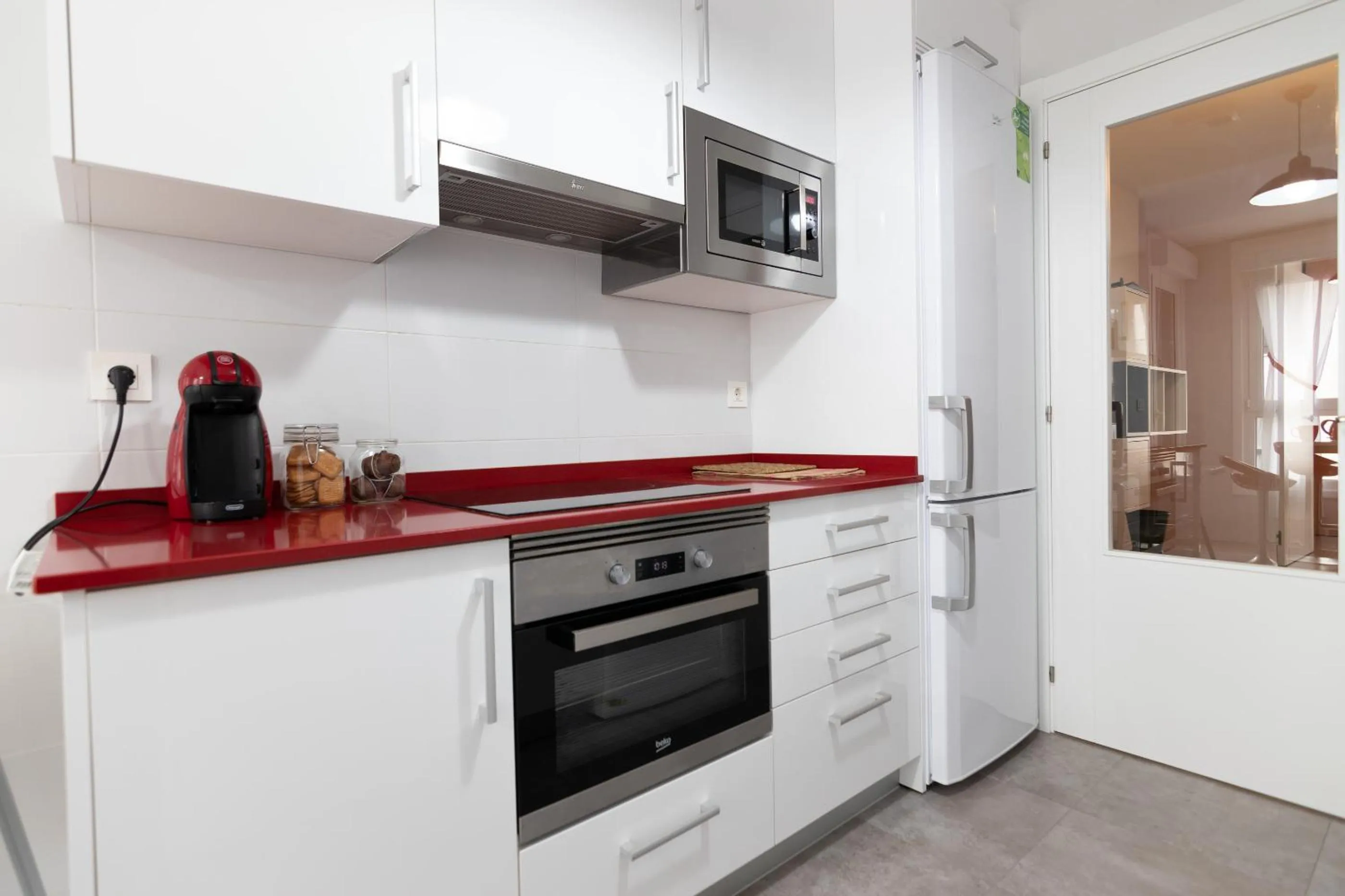 Kitchen or kitchenette in Telmo's Home con PARKING -Sirimiri Apartments-