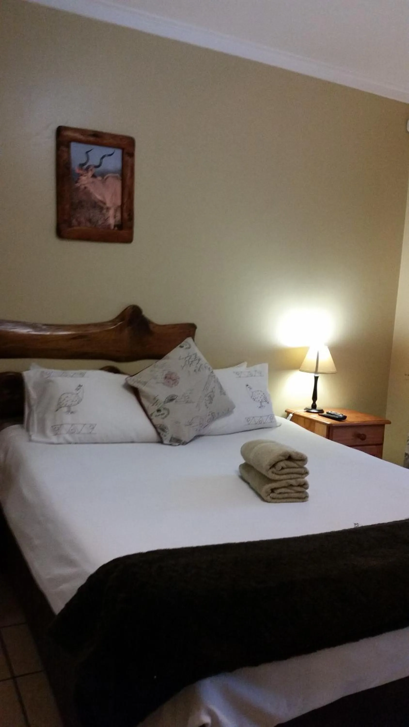 Bed in Kalahari Guest House