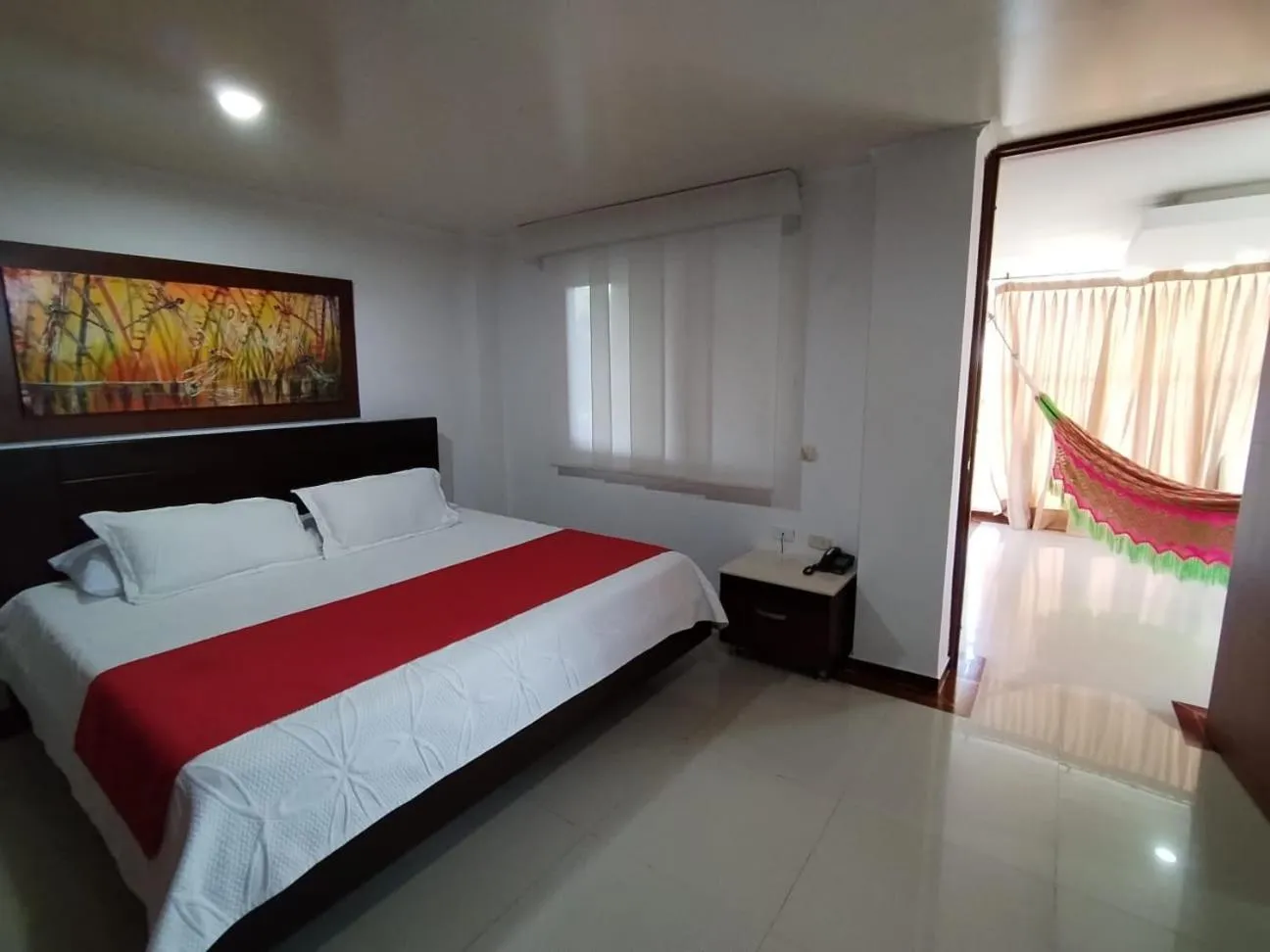 Balcony/Terrace, Bed in Hotel El Bosque Valledupar