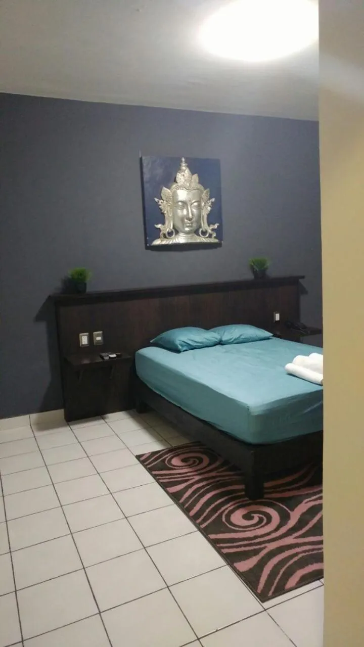 Bed in Hotel Peccato Originale