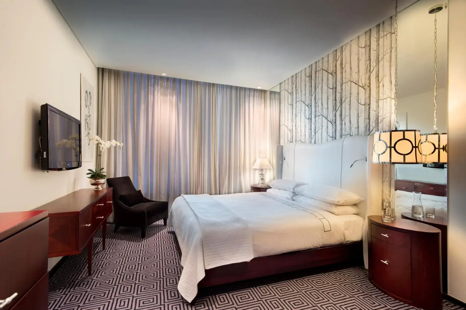 Bed in DAVINCI Suites Bed in DAVINCI Suites