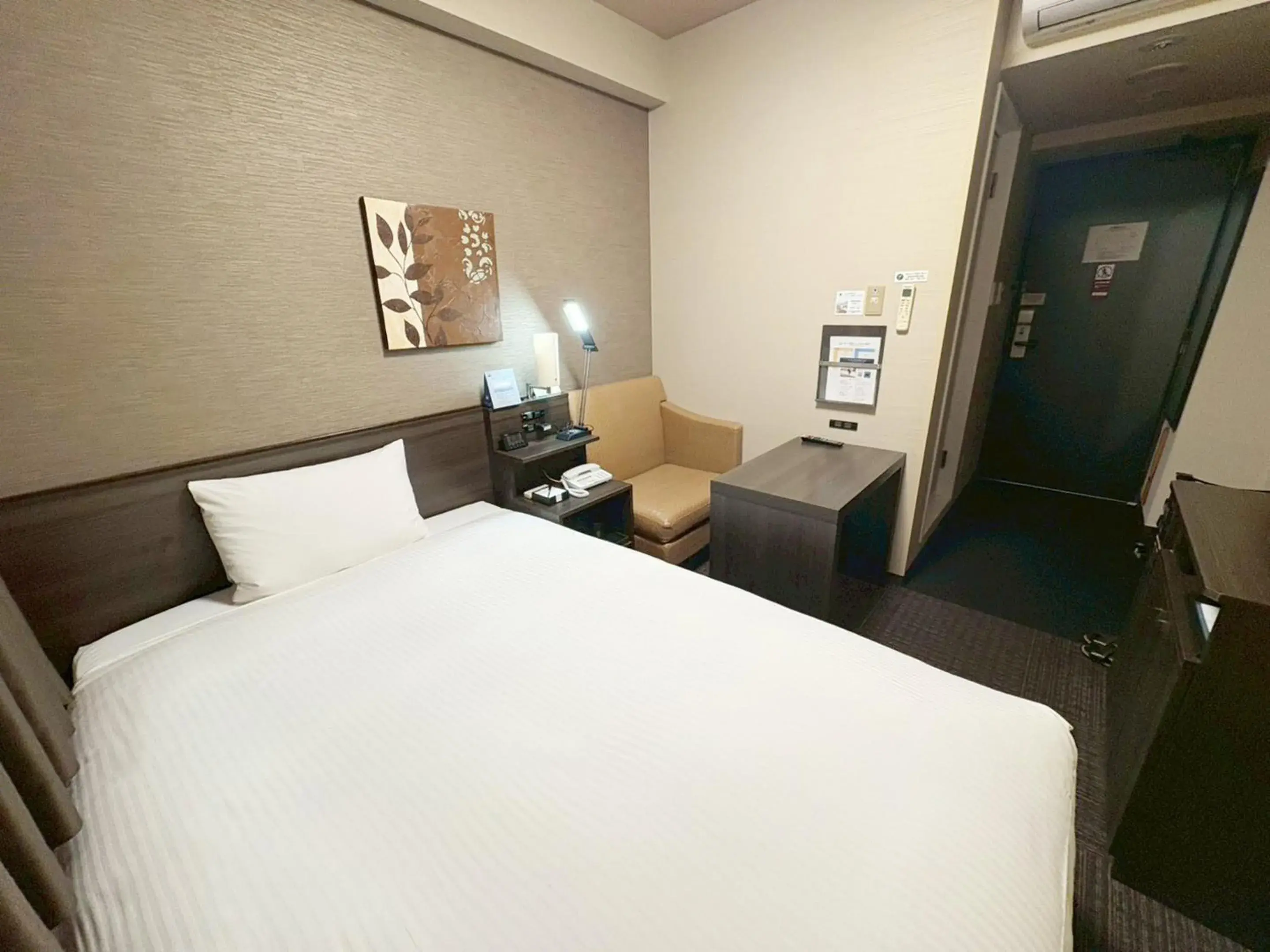 Photo of the whole room, Bed in Hotel Route-Inn Higashihiroshima Saijo Ekimae Photo of the whole room, Bed in Hotel Route-Inn Higashihiroshima Saijo Ekimae