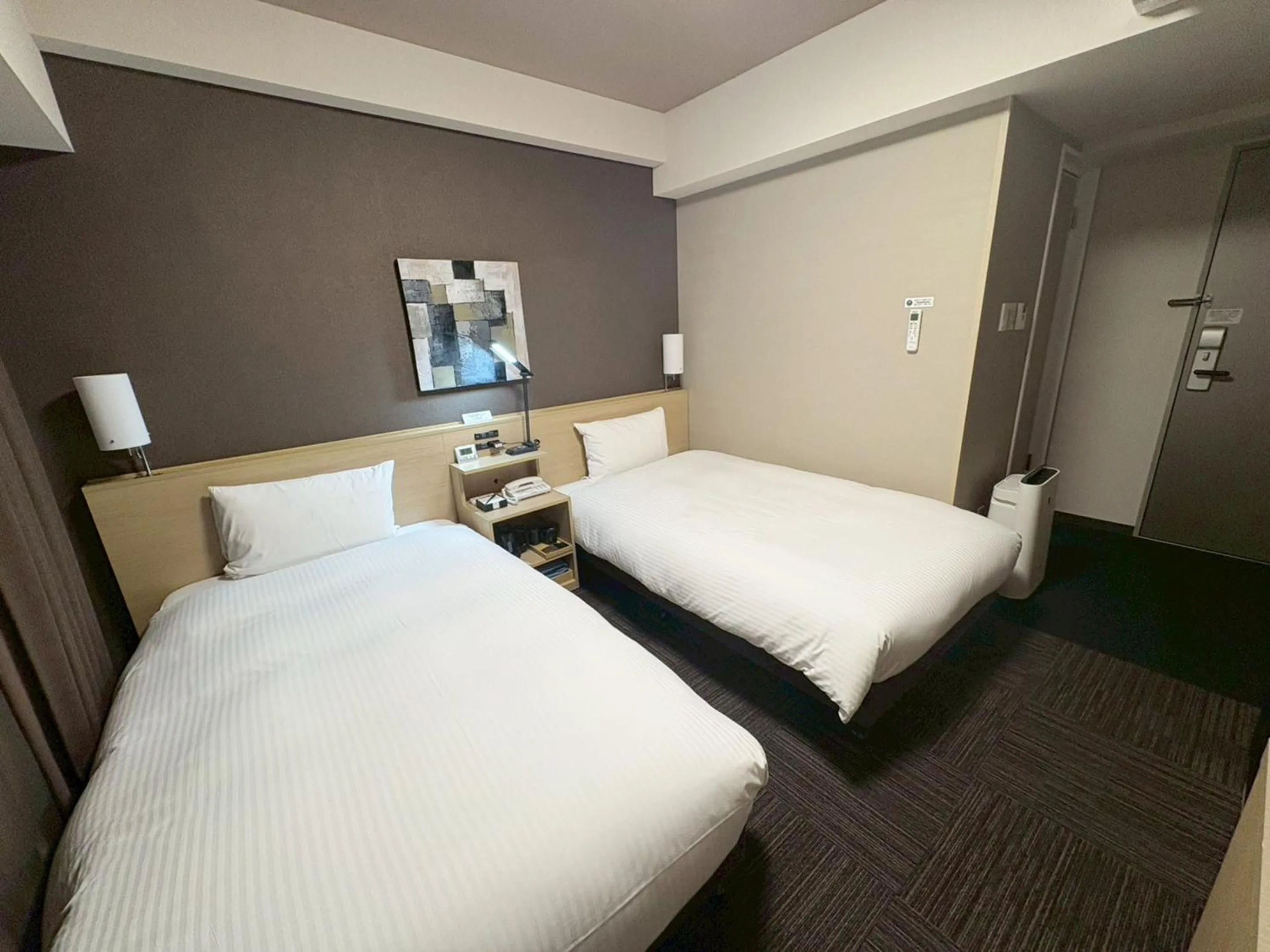 Photo of the whole room, Bed in Hotel Route-Inn Higashihiroshima Saijo Ekimae