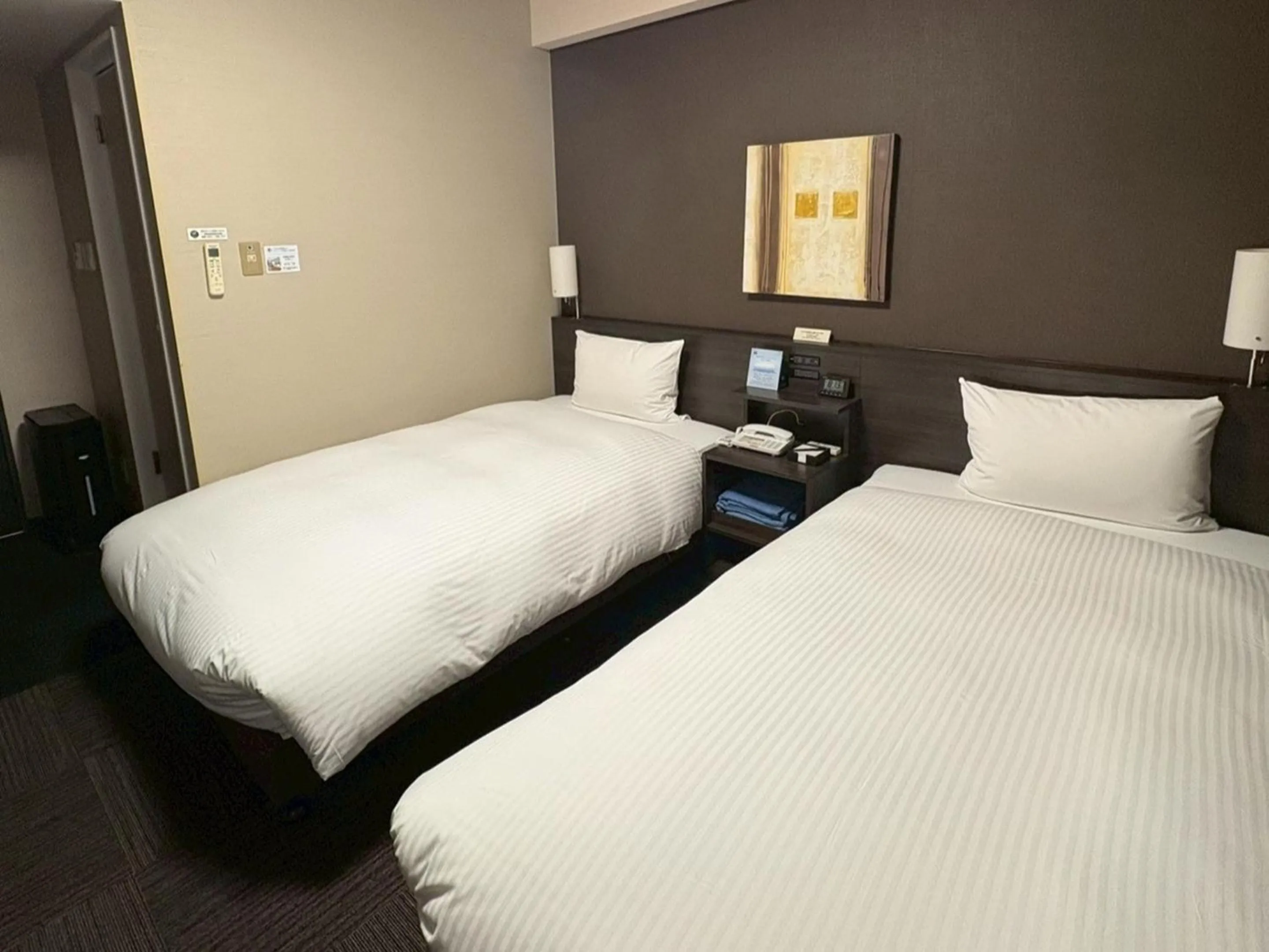 Photo of the whole room, Bed in Hotel Route-Inn Higashihiroshima Saijo Ekimae