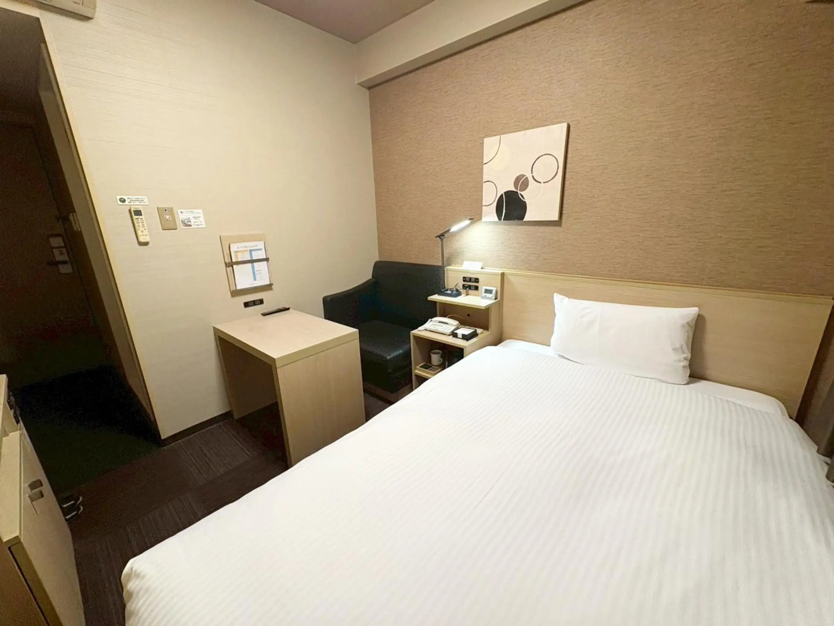 Photo of the whole room, Bed in Hotel Route-Inn Higashihiroshima Saijo Ekimae Photo of the whole room, Bed in Hotel Route-Inn Higashihiroshima Saijo Ekimae
